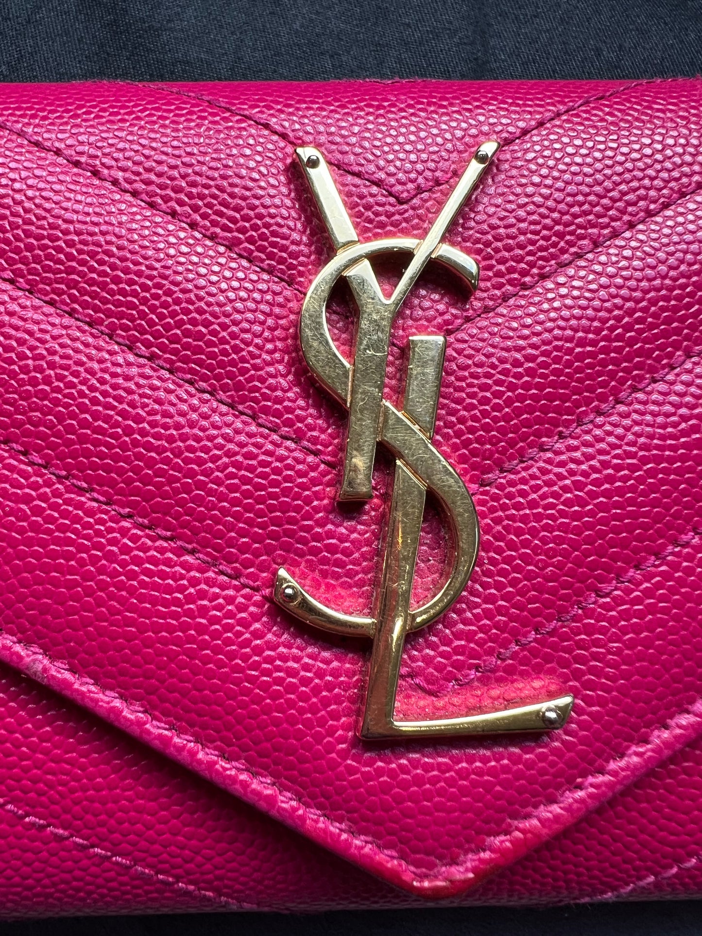 Pink Saint Laurent wallet on chain