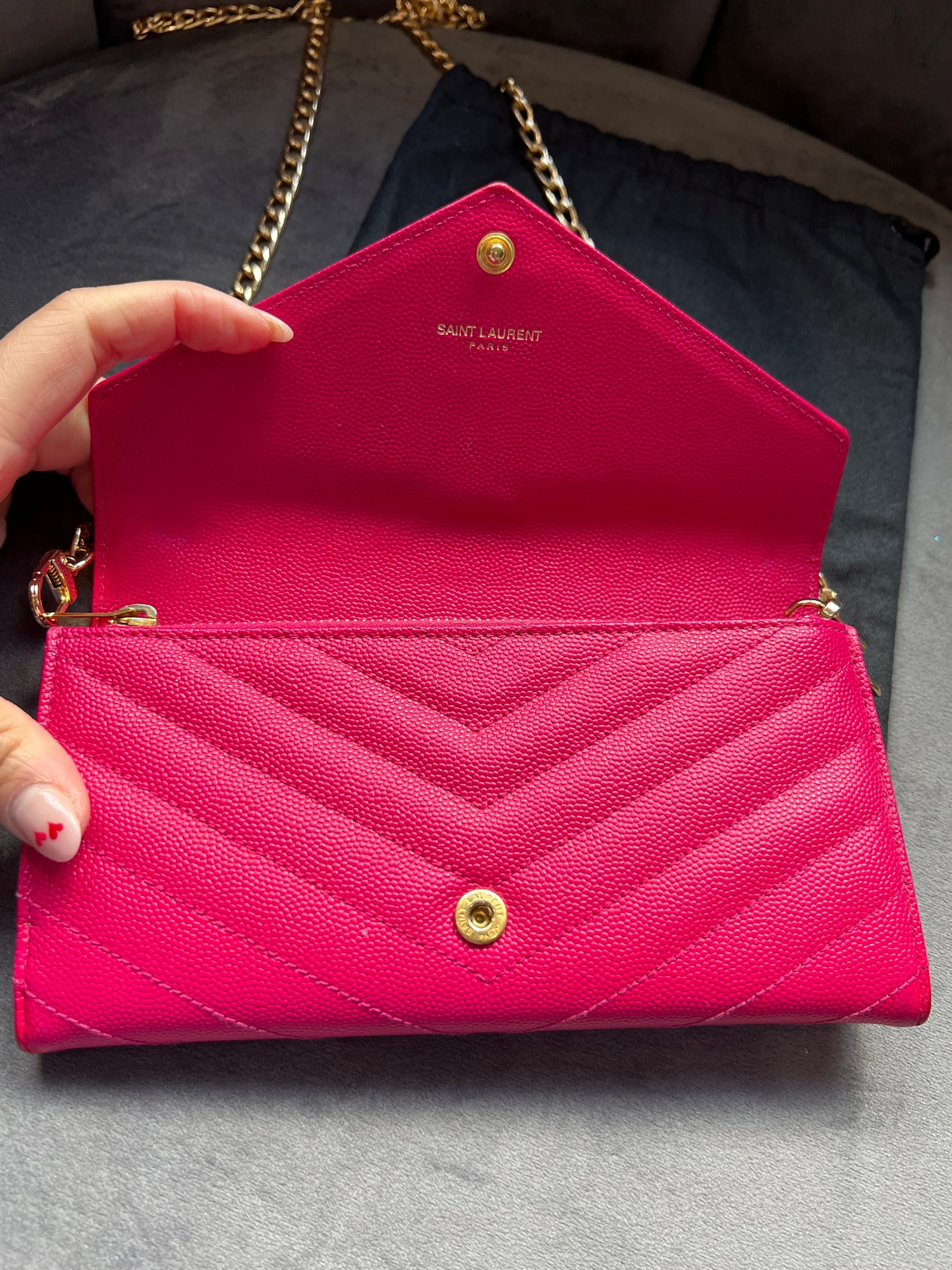 Pink Saint Laurent wallet on chain