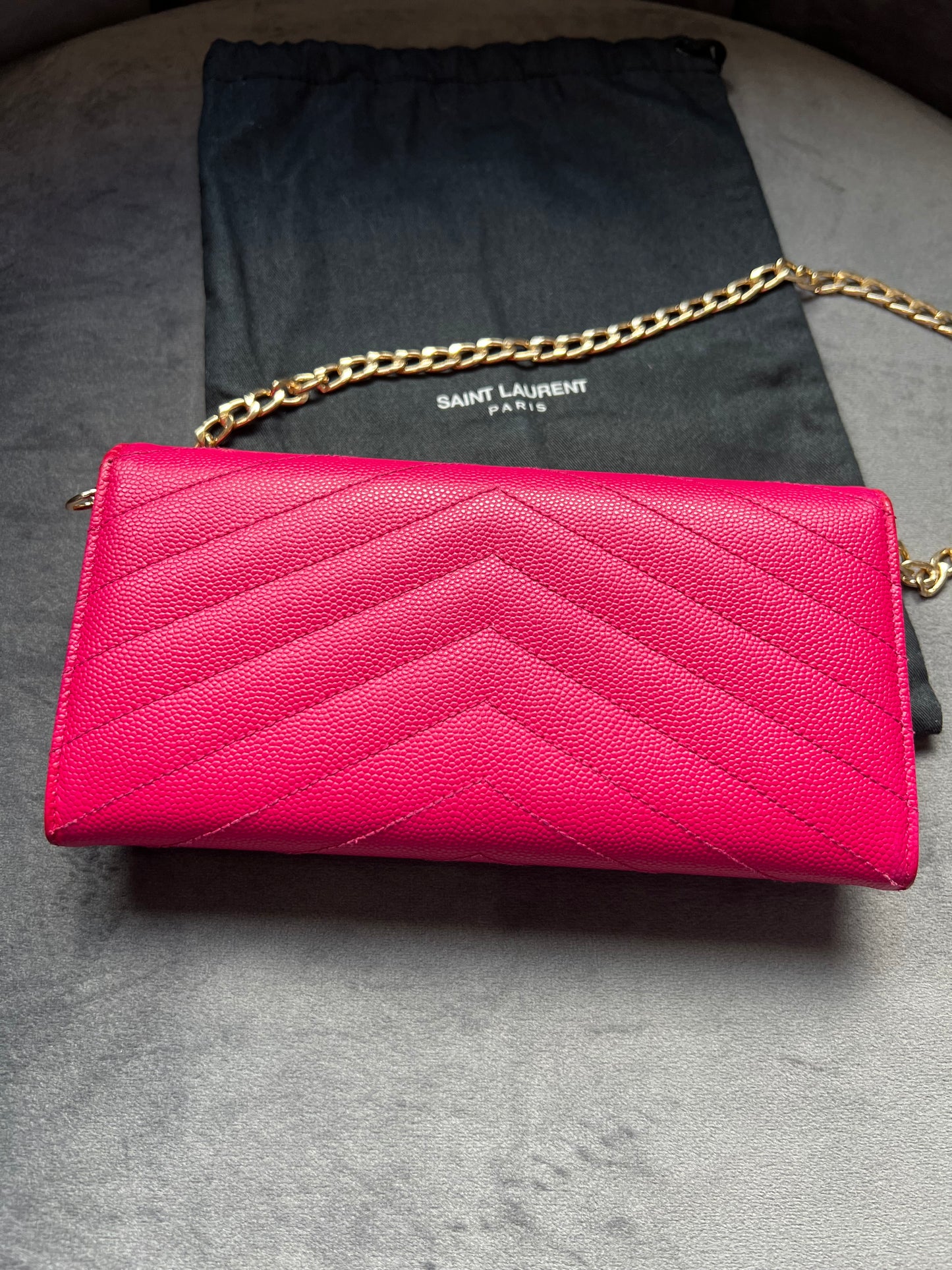 Pink Saint Laurent wallet on chain