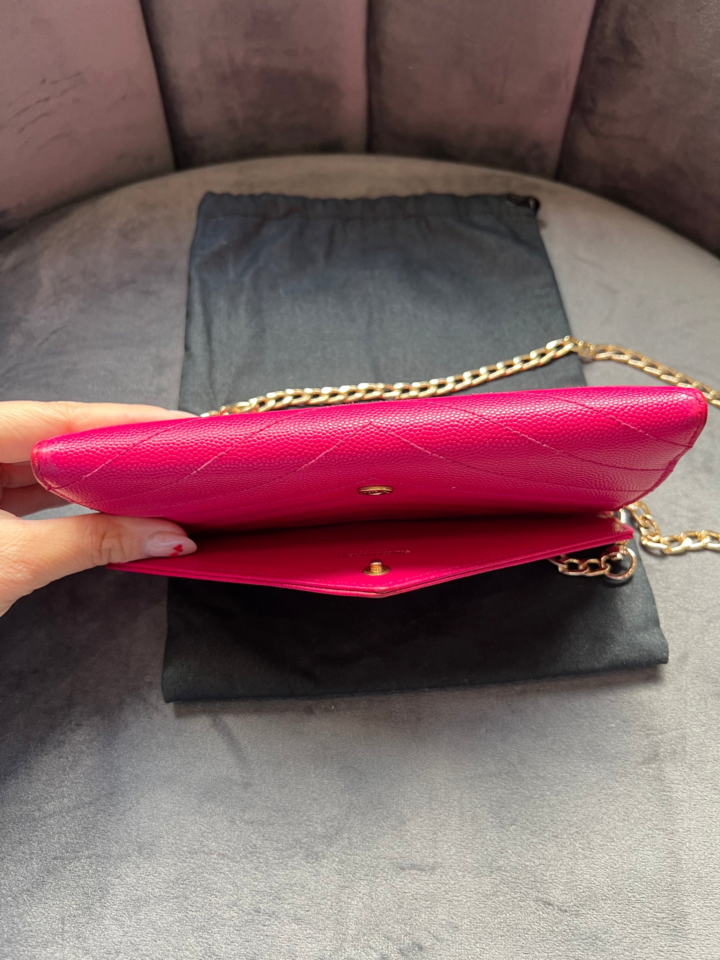 Pink Saint Laurent wallet on chain