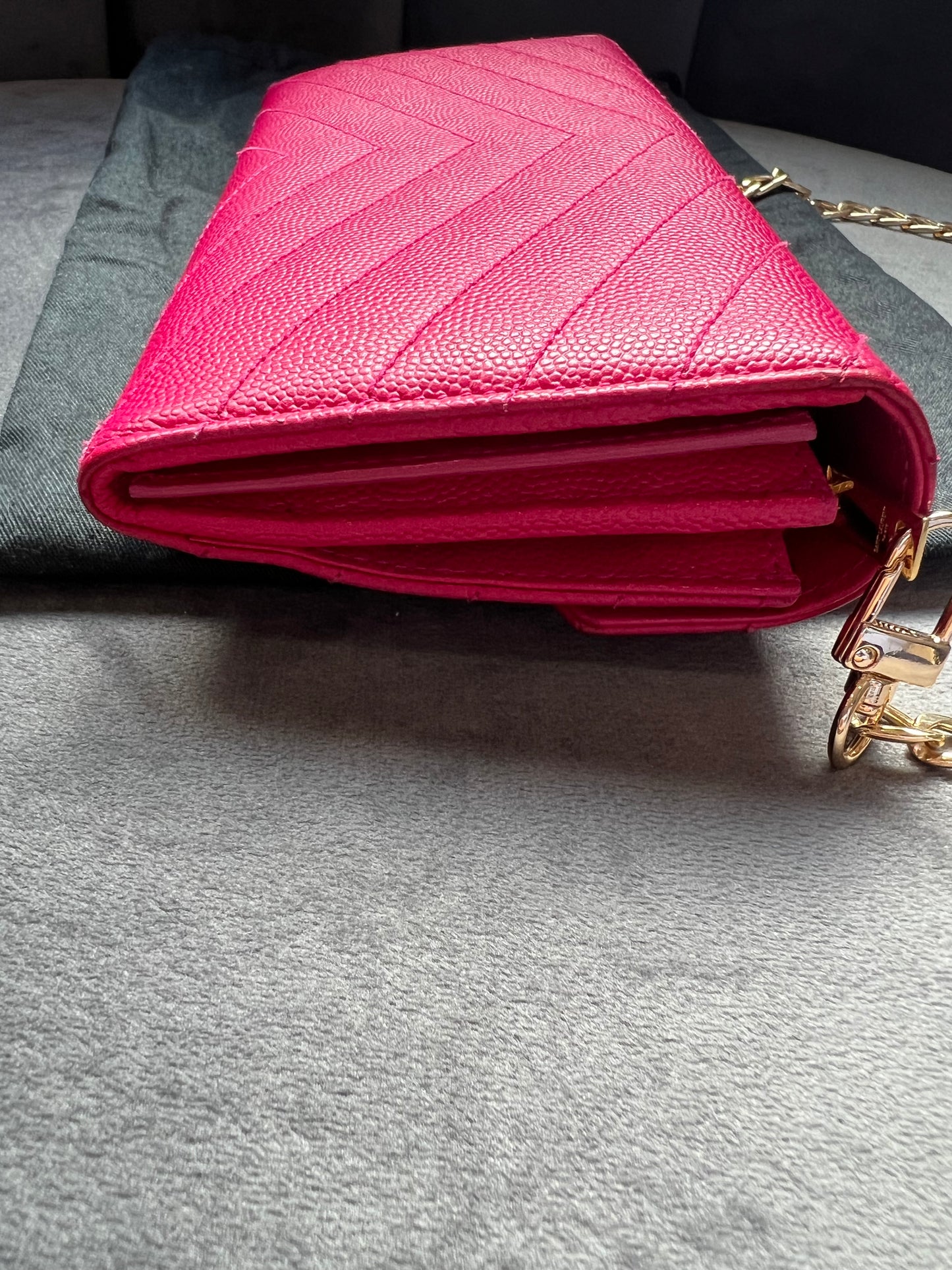 Pink Saint Laurent wallet on chain