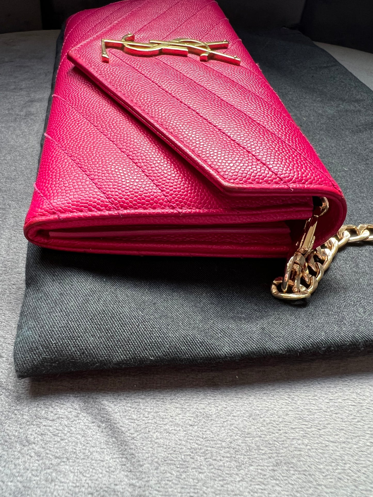 Pink Saint Laurent wallet on chain