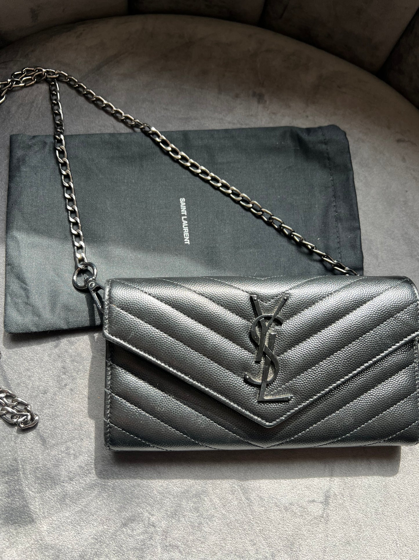 YSL Cassandre all black envelope flap wallet on chain