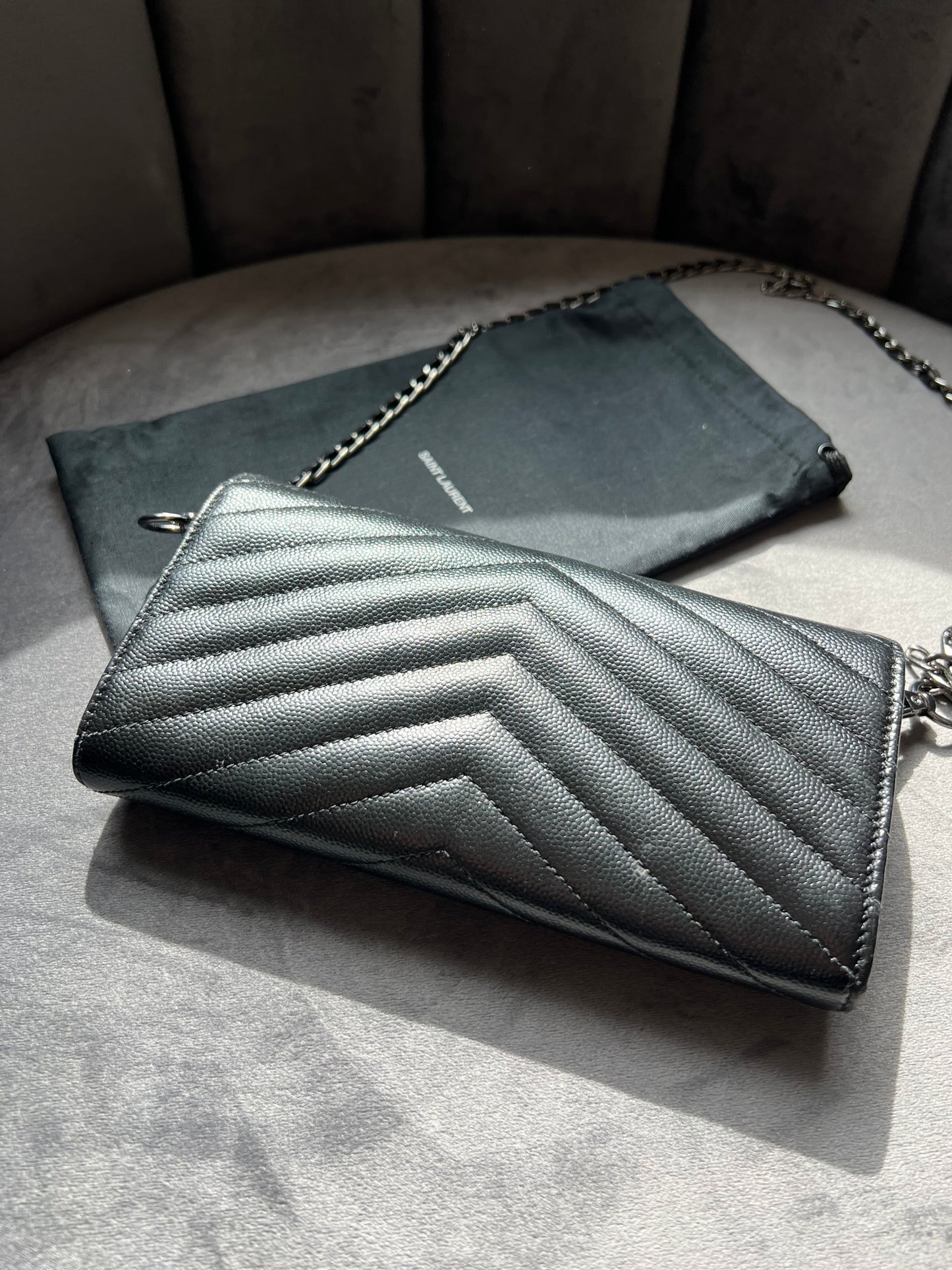 YSL Cassandre all black envelope flap wallet on chain