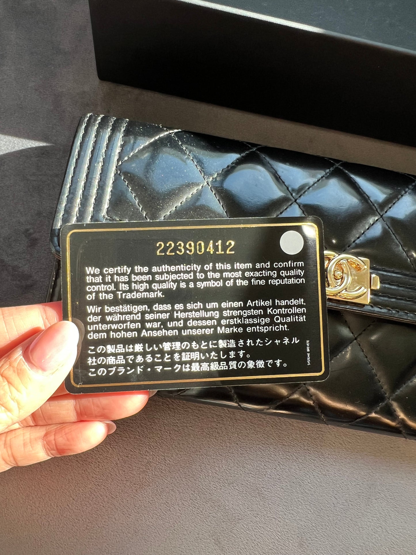 Chanel Boy Gusseted black wallet on chain