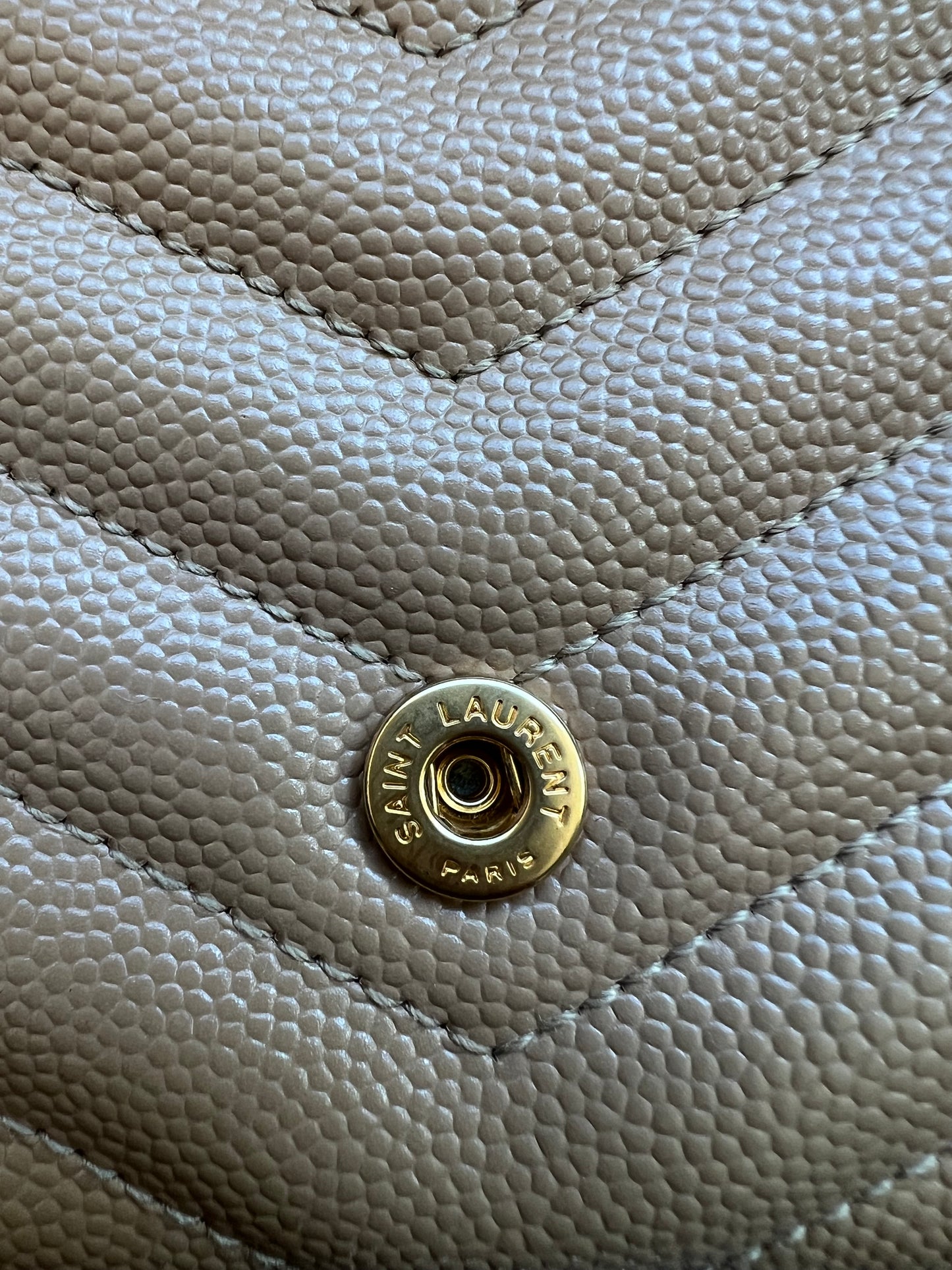 Beige YSL cassandre wallet on chain