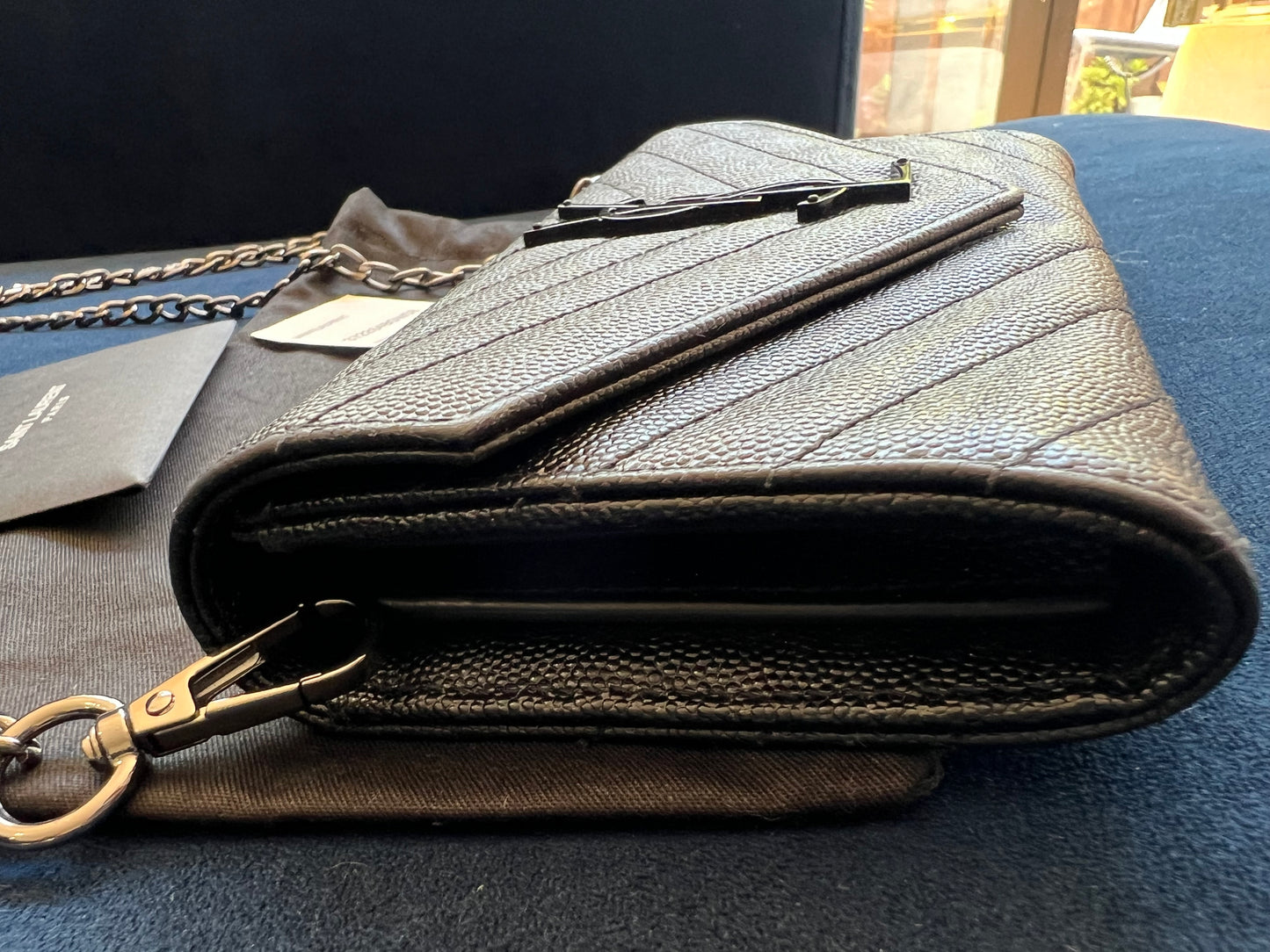 YSL Cassandre all black envelope flap wallet on chain