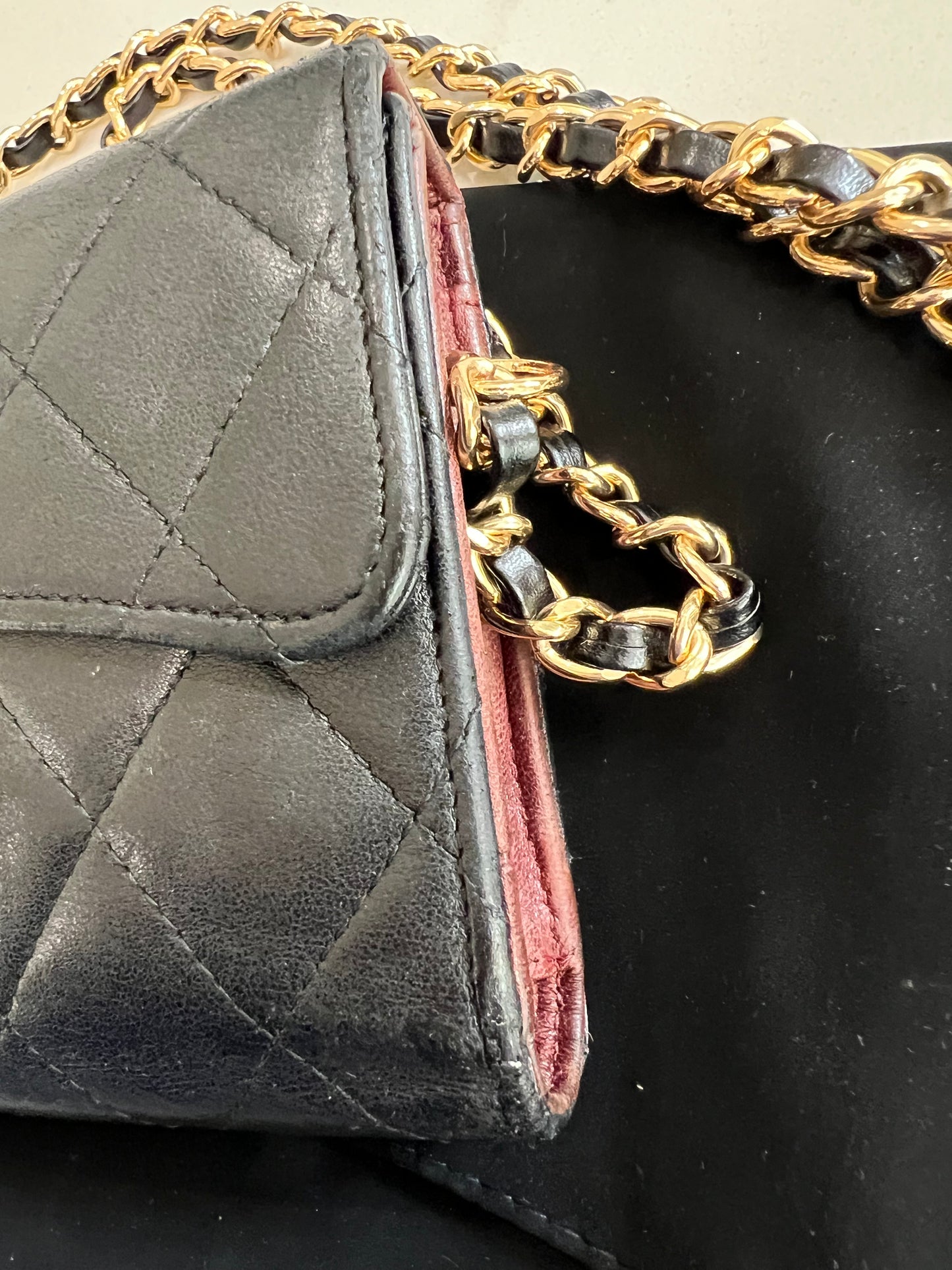 Black Chanel timeless wallet on chain
