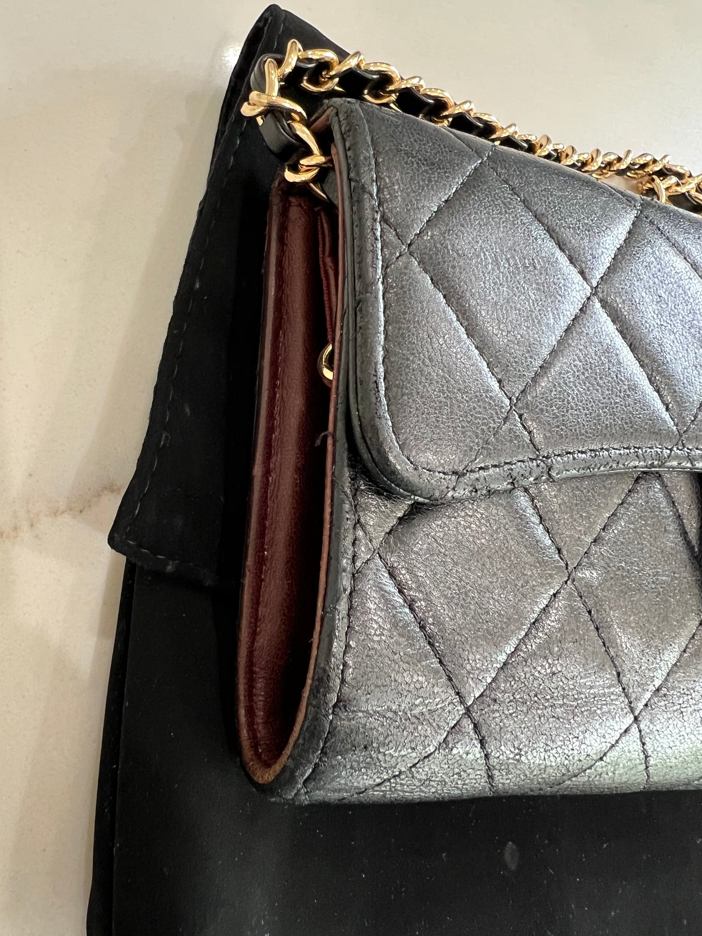 Black Chanel timeless wallet on chain