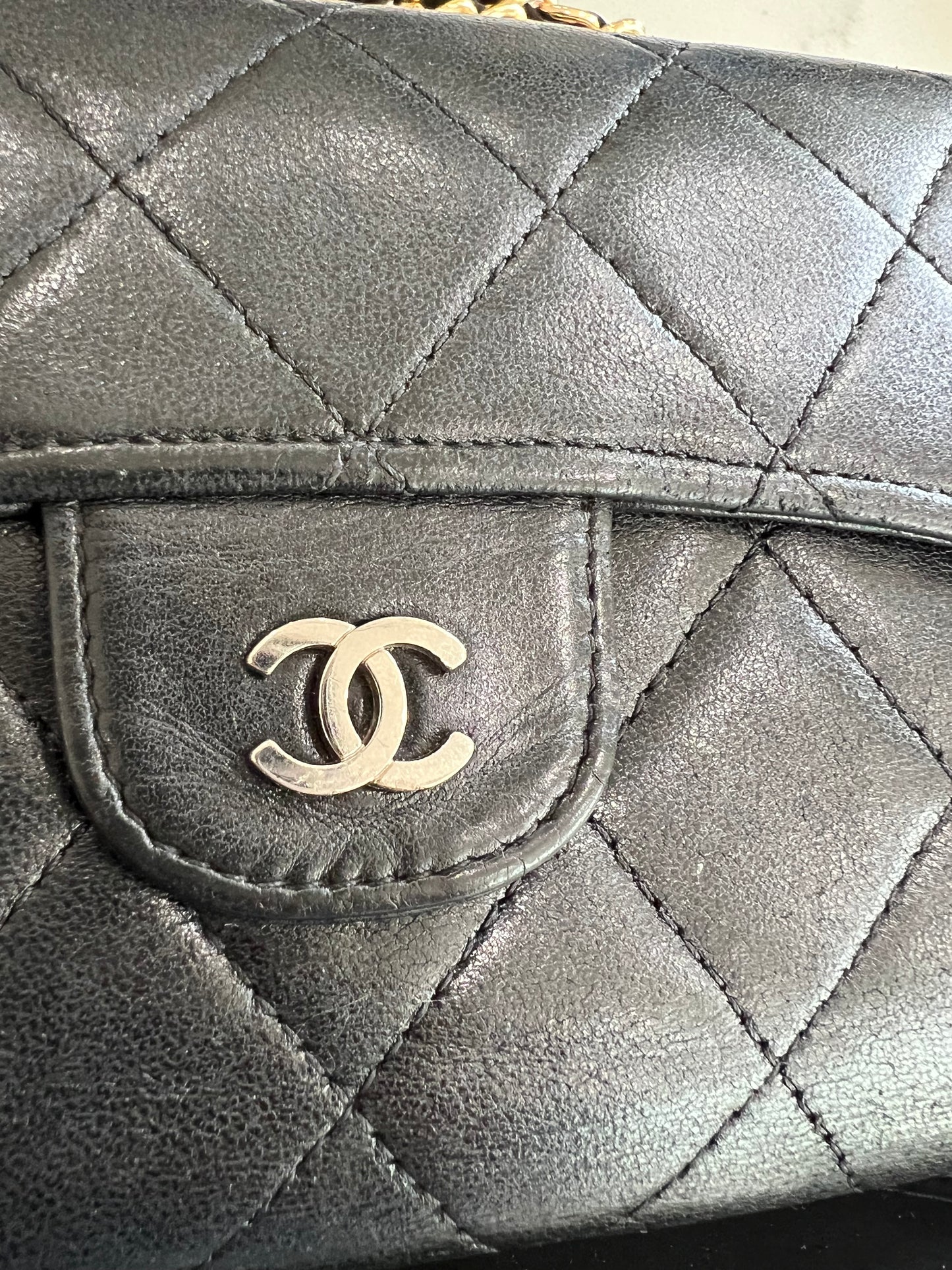 Black Chanel timeless wallet on chain