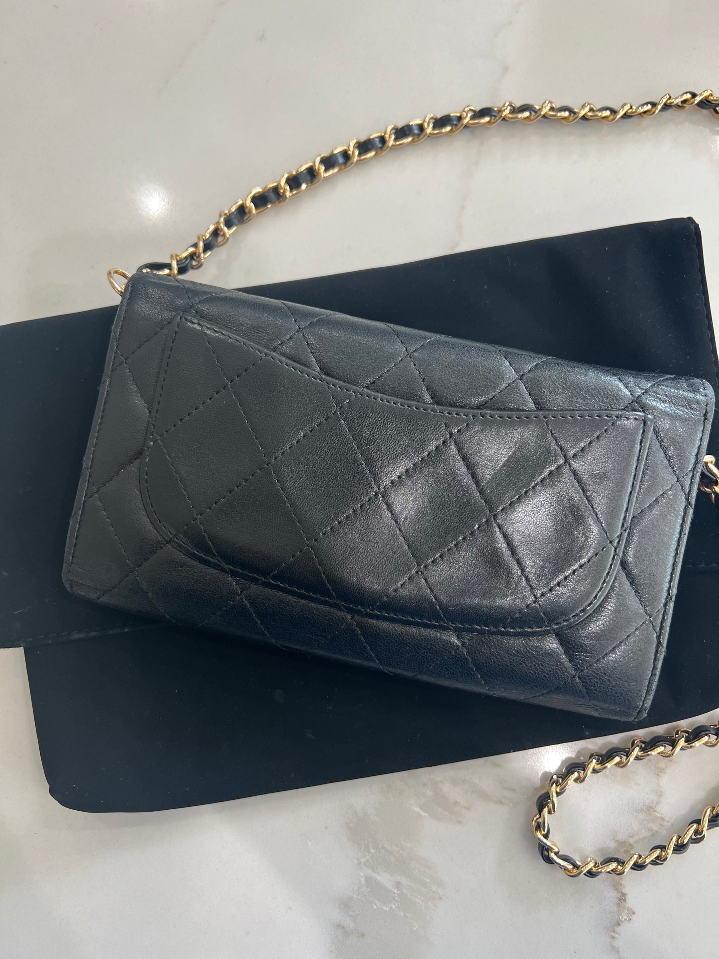 Black Chanel timeless wallet on chain