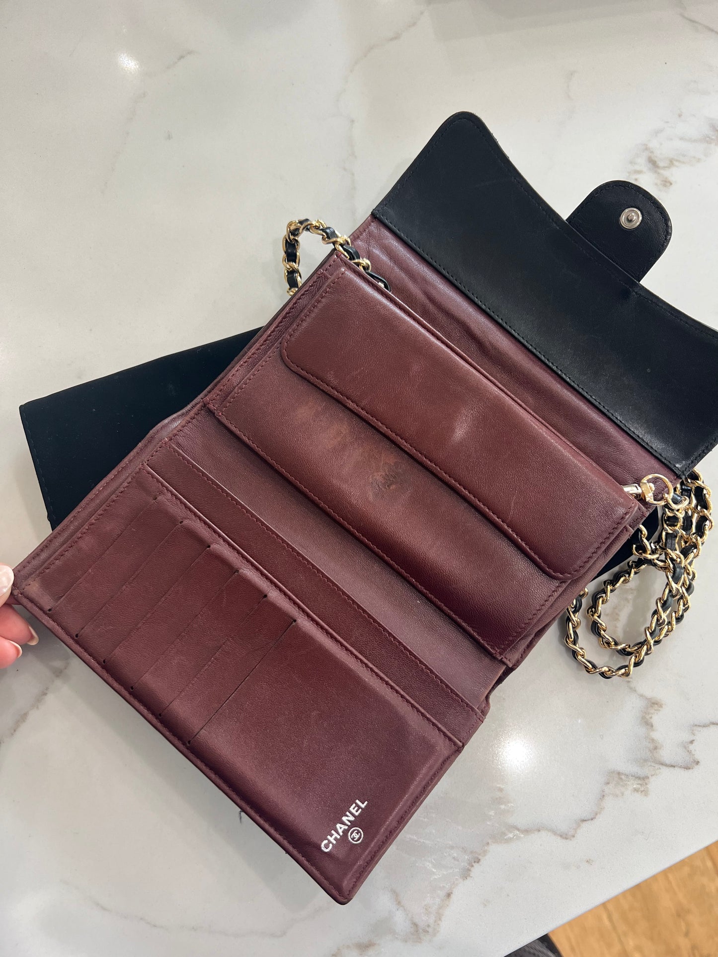 Black Chanel timeless wallet on chain