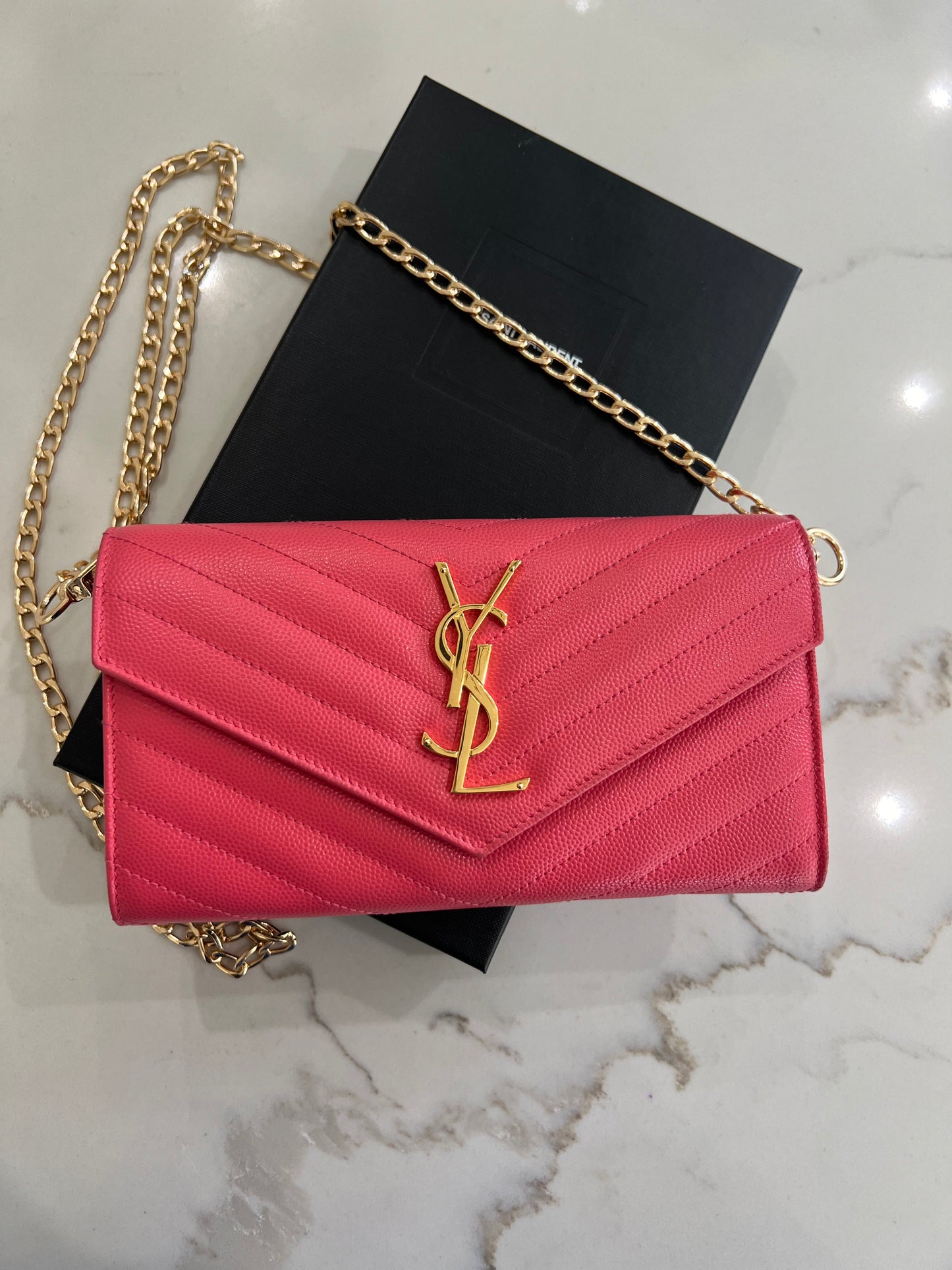 Pink YSL cassandre envelope wallet on chain