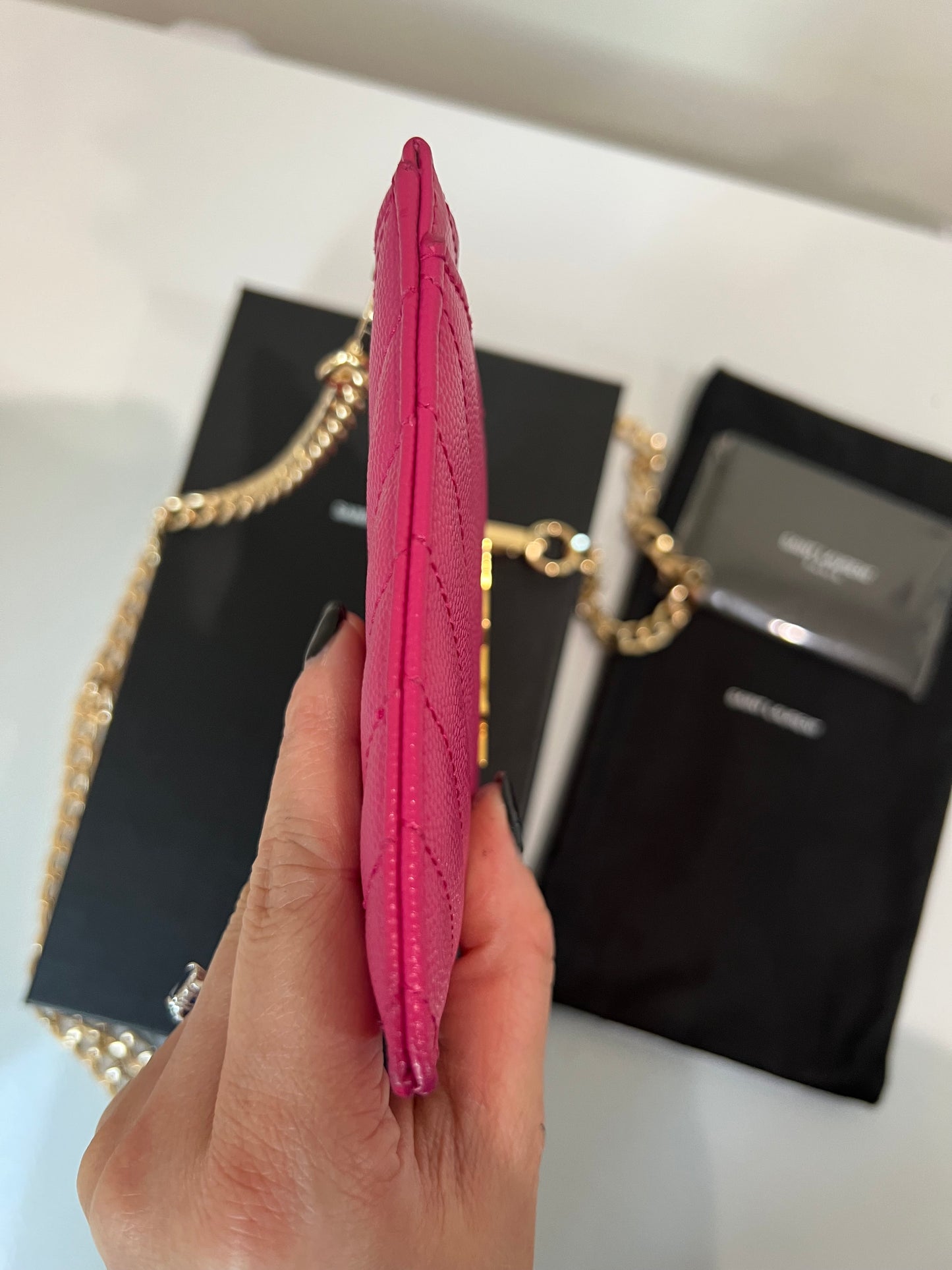 Pink YSL monogram clutch on chain