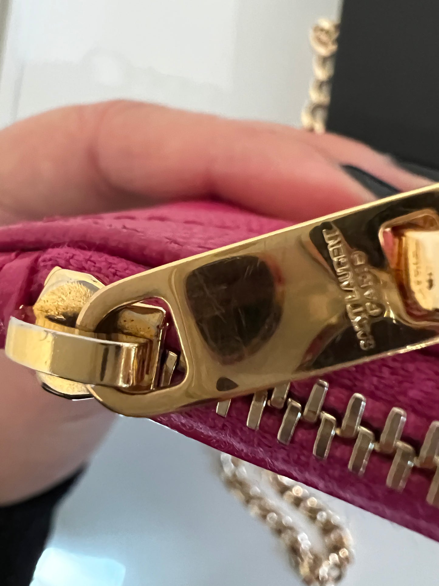 Pink YSL monogram clutch on chain