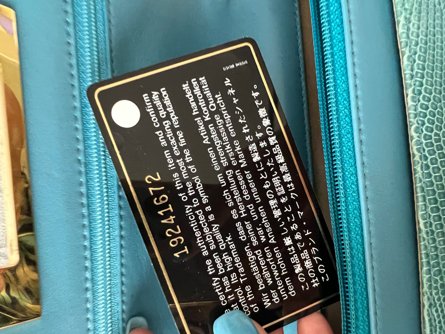 Chanel turquoise golden class lizard skin