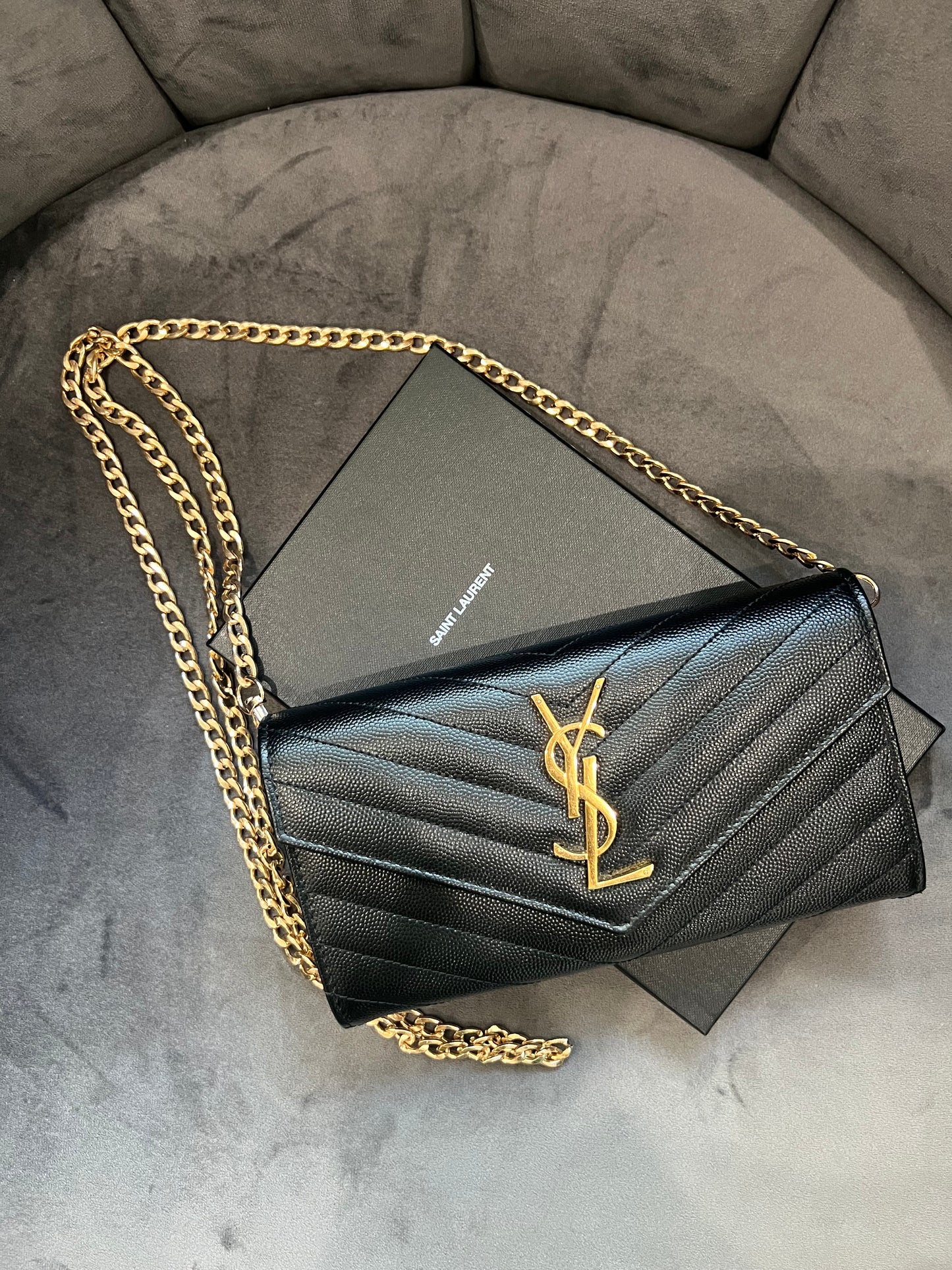 Black YSL cassandre envelope wallet on chain