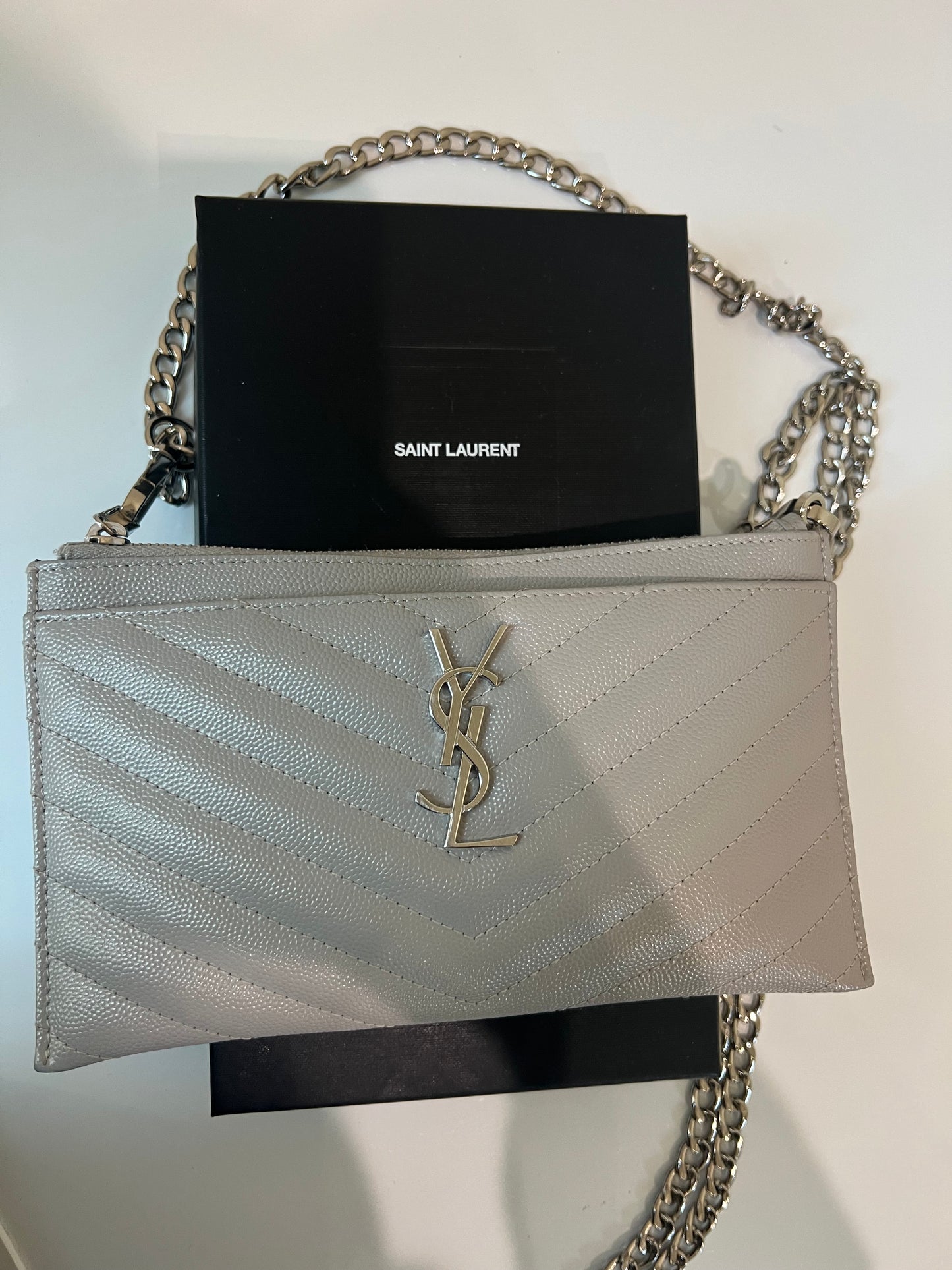Grey YSL monogram clutch on chain