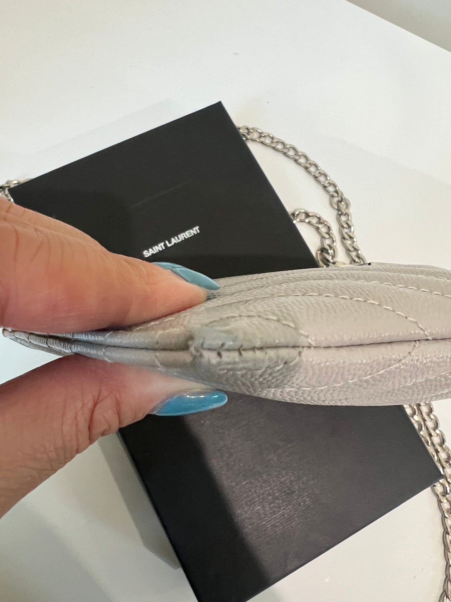 Grey YSL monogram clutch on chain