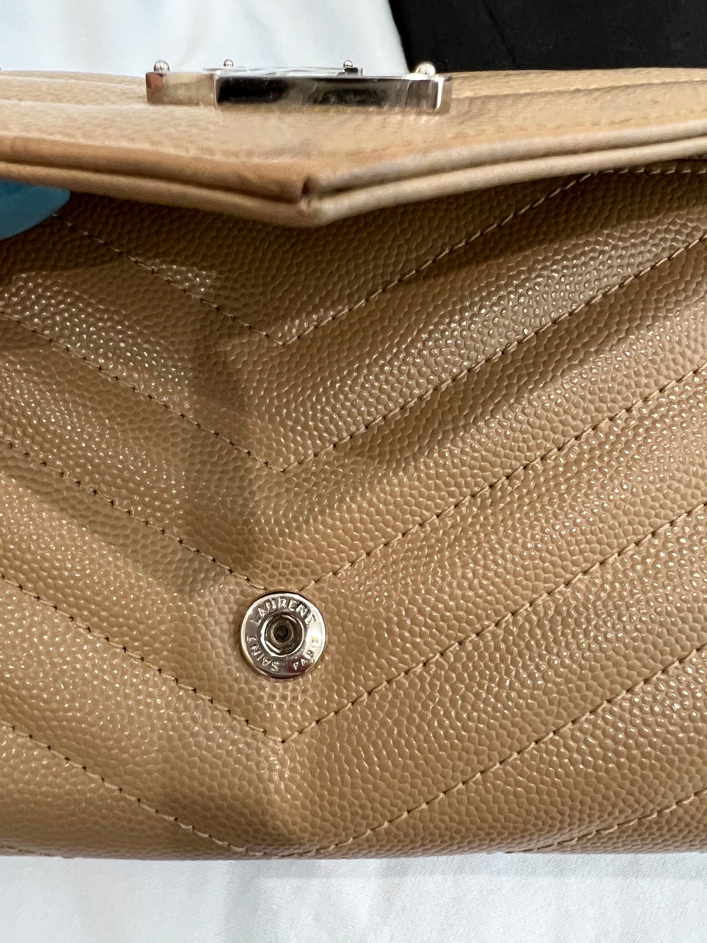 Beige YSL cassandre wallet on chain