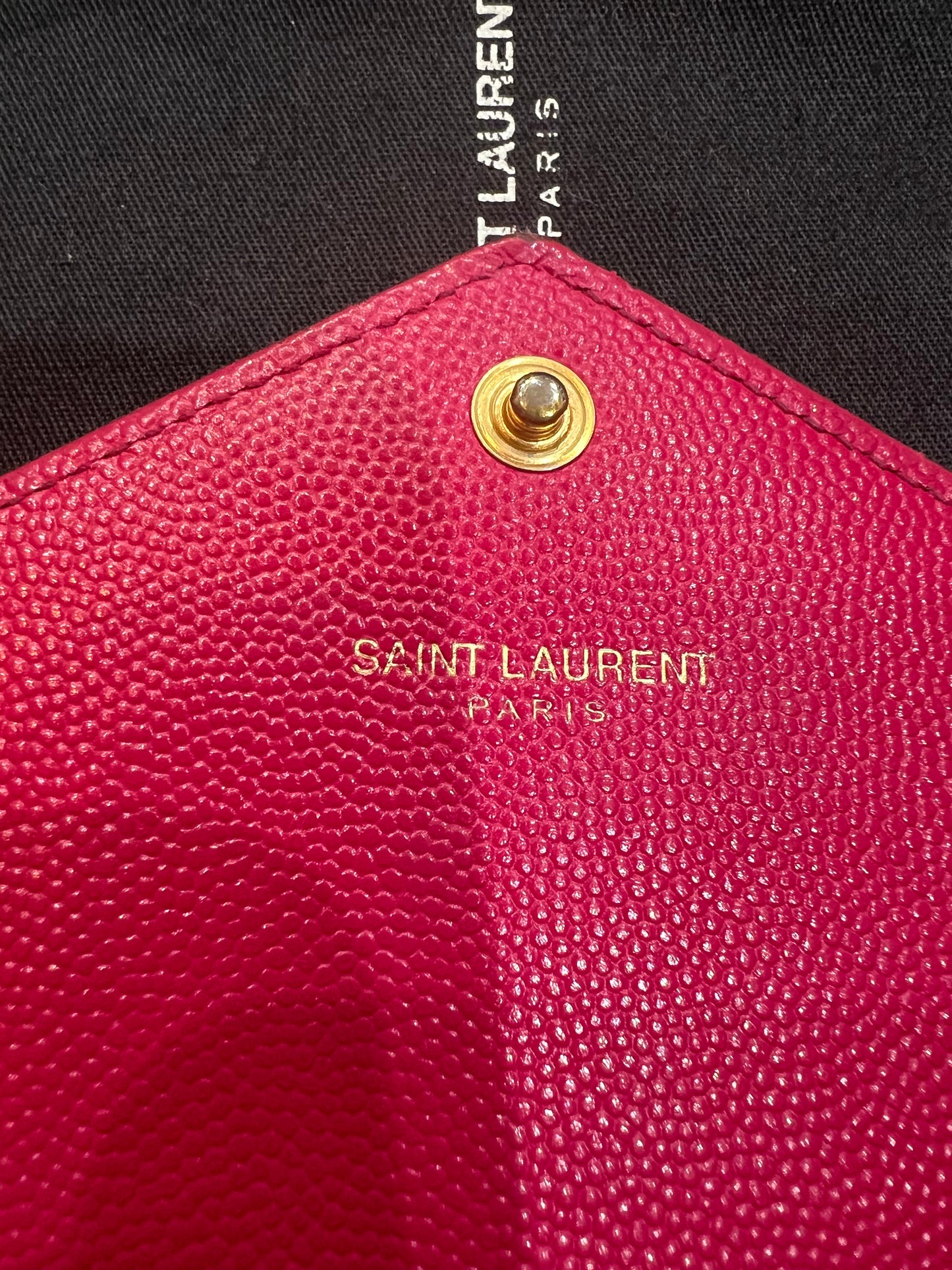 Pink Saint Laurent wallet on chain