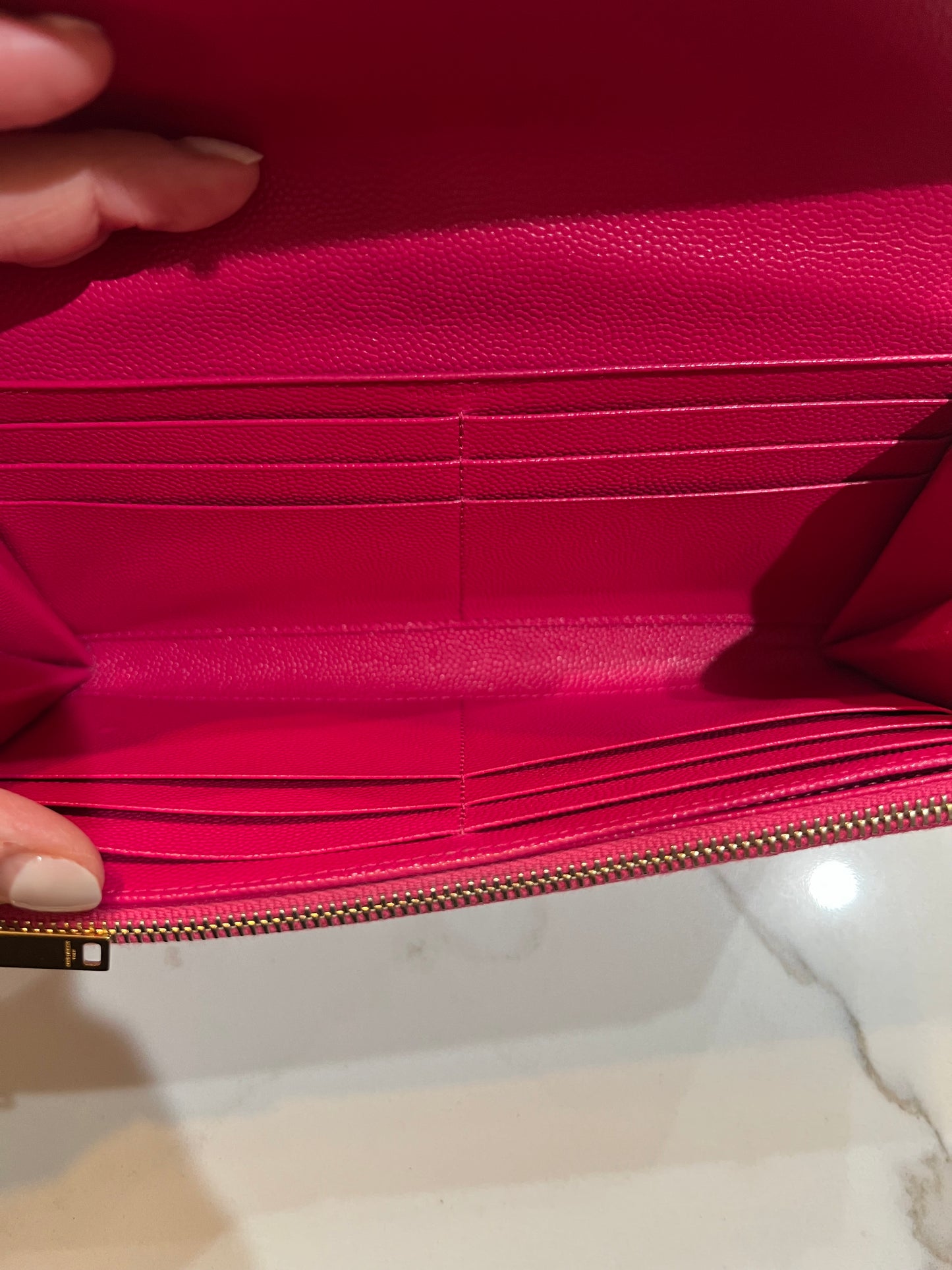 Pink Saint Laurent wallet on chain