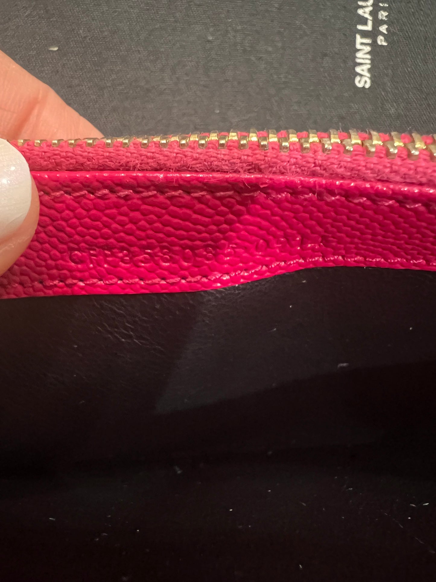 Pink Saint Laurent wallet on chain