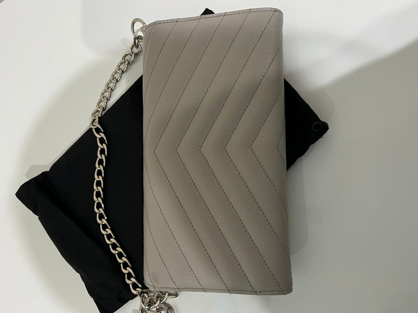 Grey YSL monogram wallet on chain