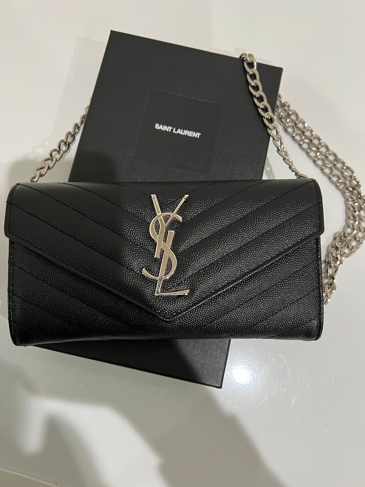Yves Saint Laurent Cassandre envelope flap wallet on chain