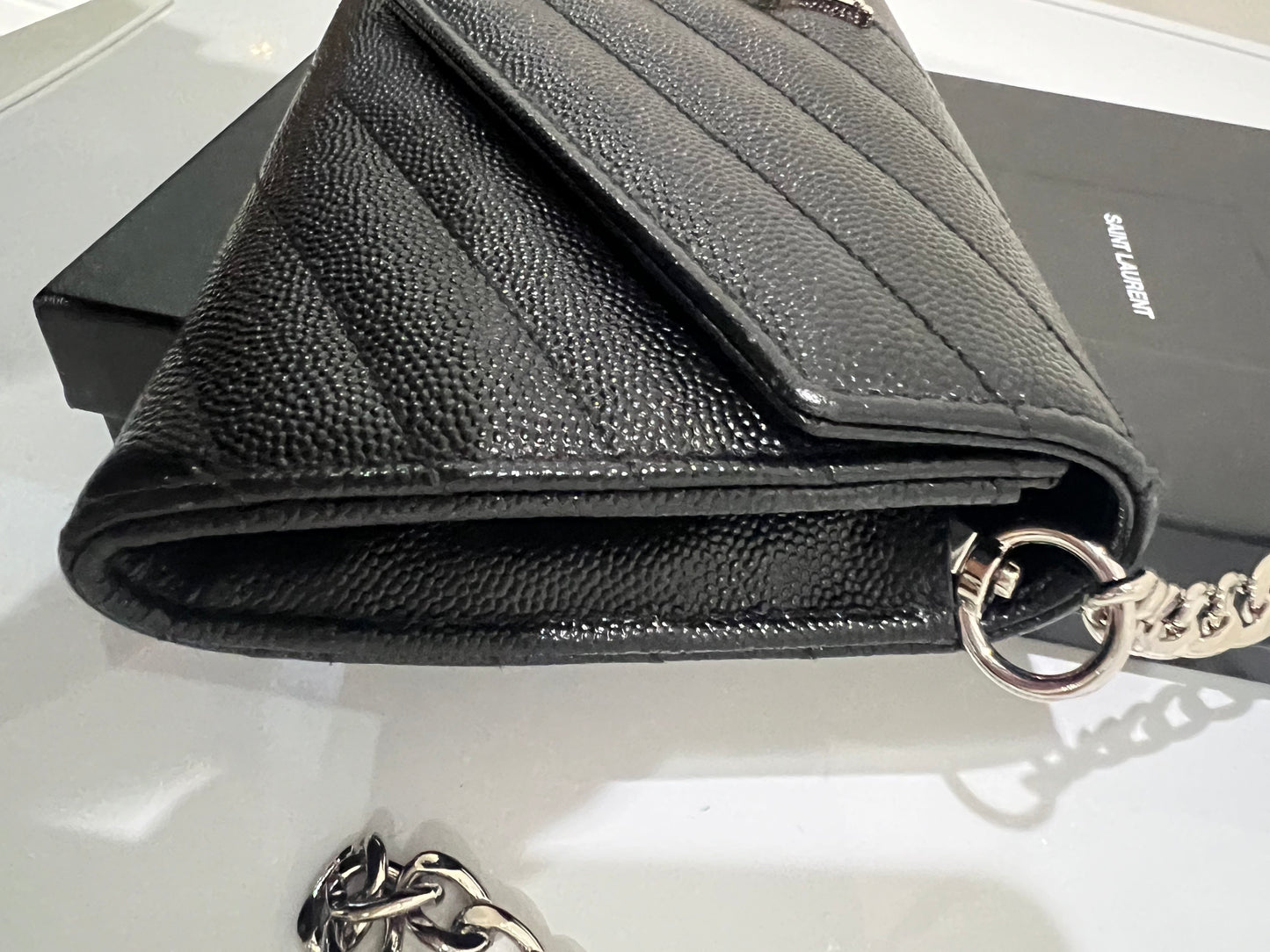 Yves Saint Laurent Cassandre envelope flap wallet on chain