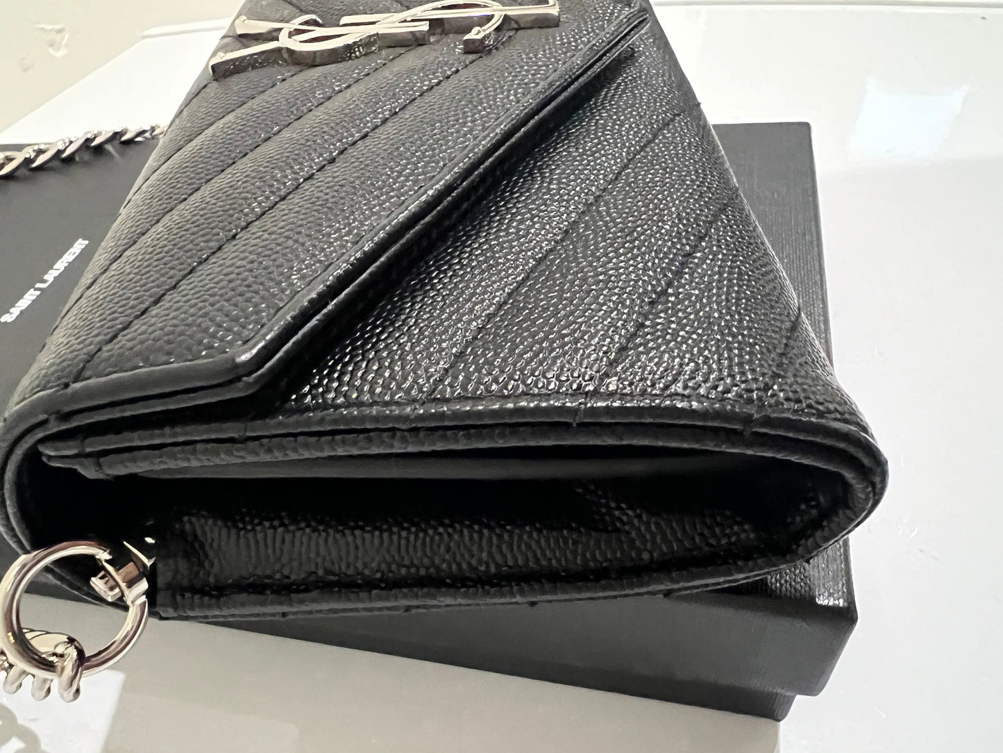 Yves Saint Laurent Cassandre envelope flap wallet on chain