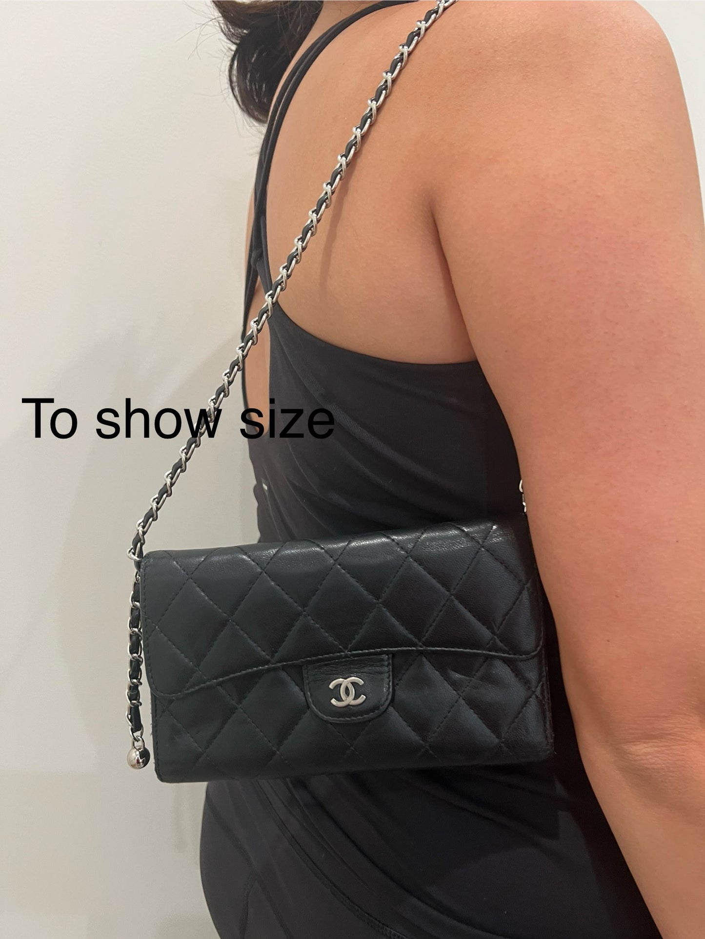 Black Chanel timeless wallet on chain