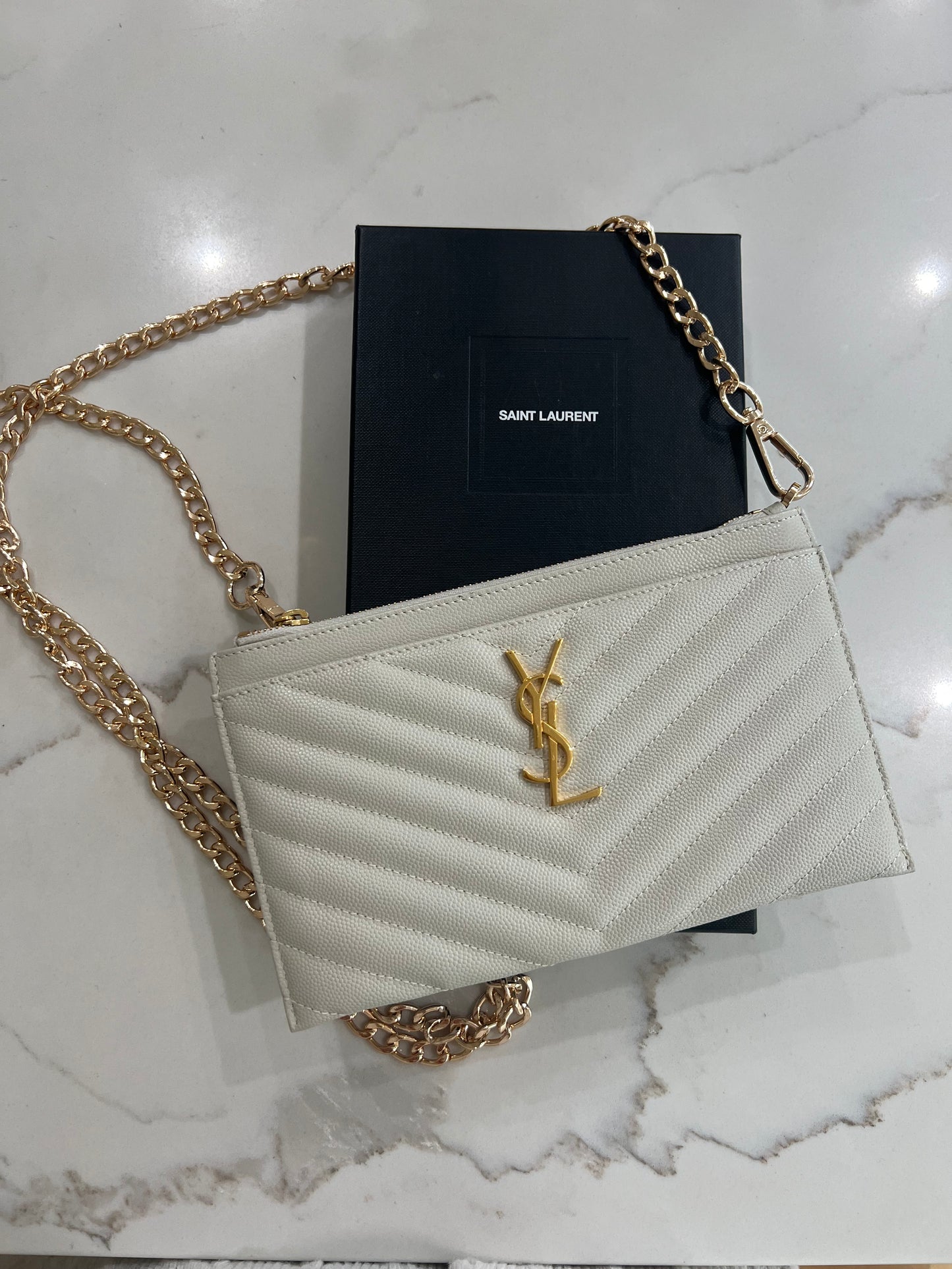 Creme YSL monogram clutch wallet on chain