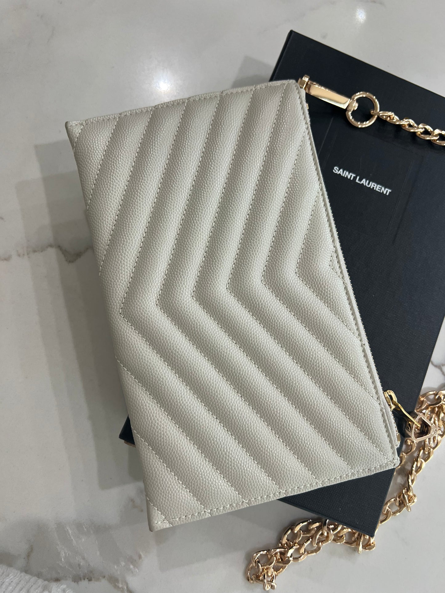 Creme YSL monogram clutch wallet on chain