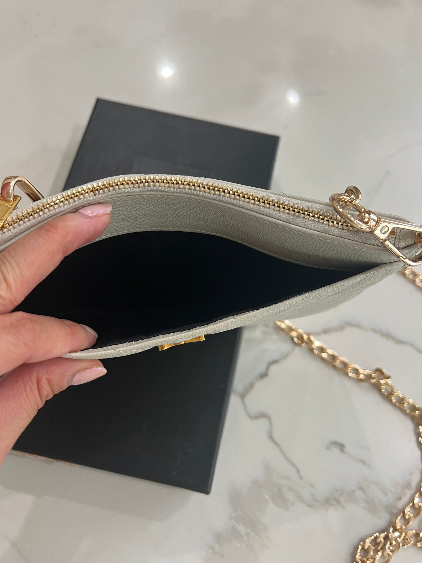 Creme YSL monogram clutch wallet on chain
