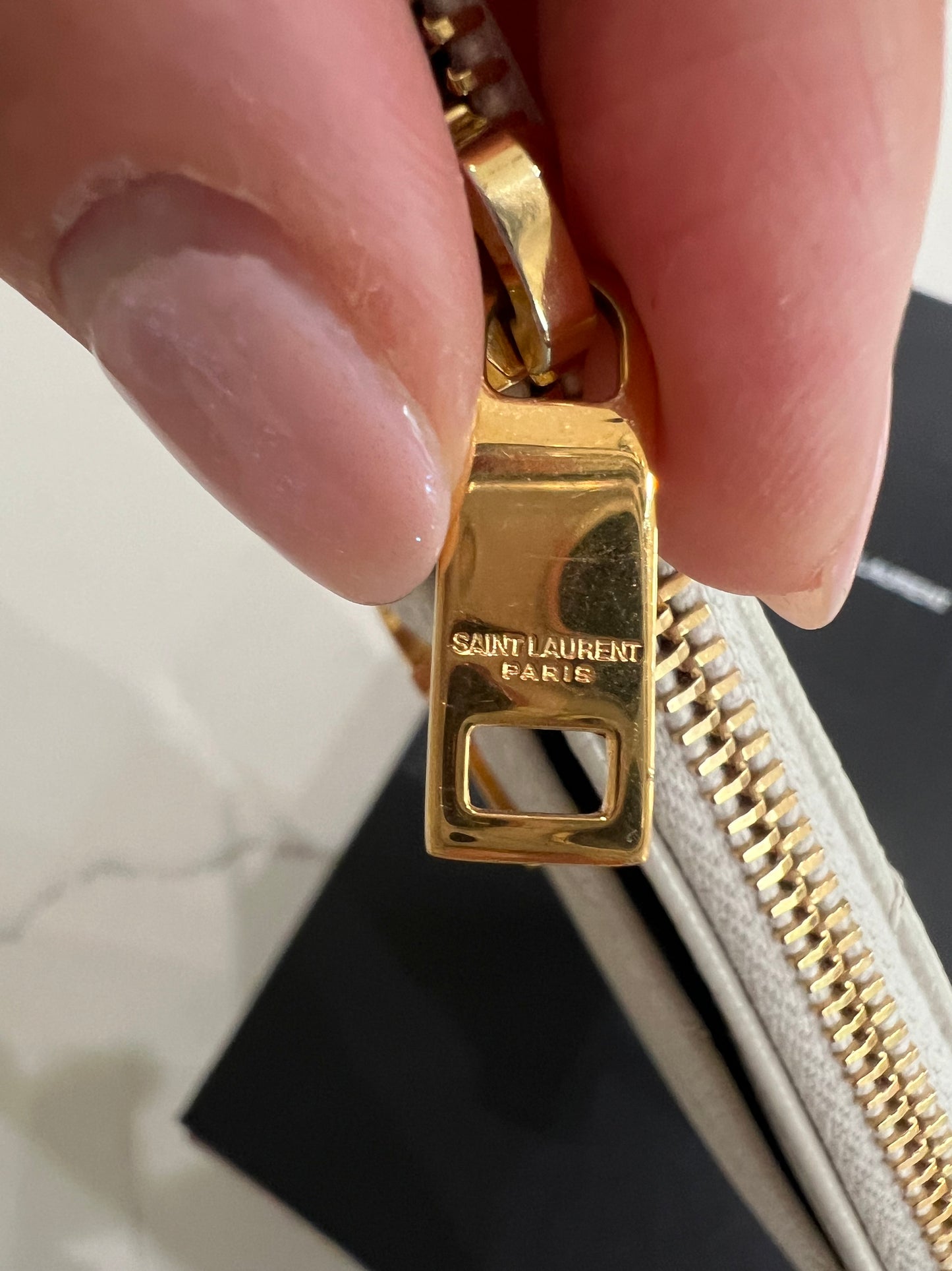 Creme YSL monogram clutch wallet on chain