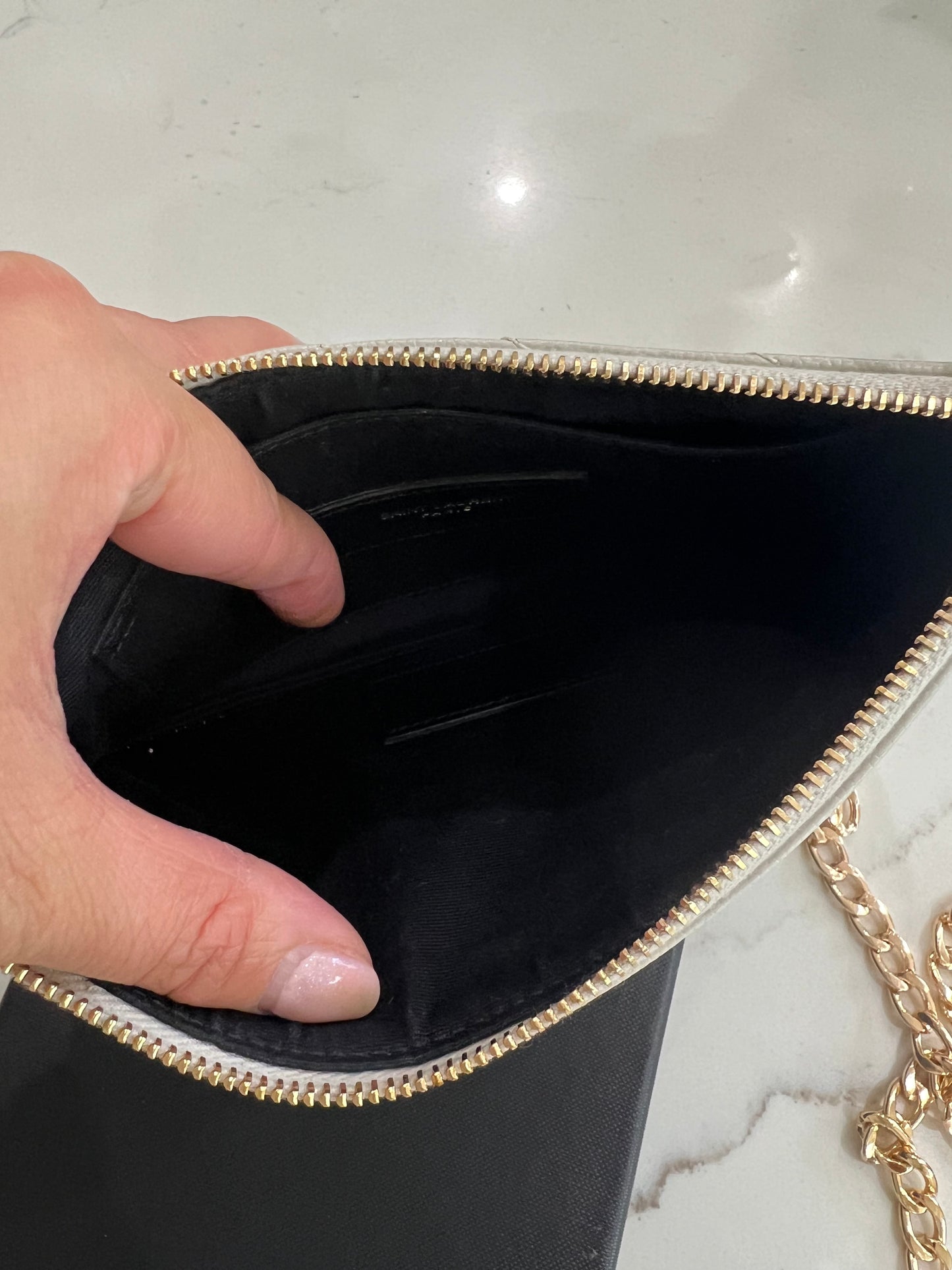 Creme YSL monogram clutch wallet on chain