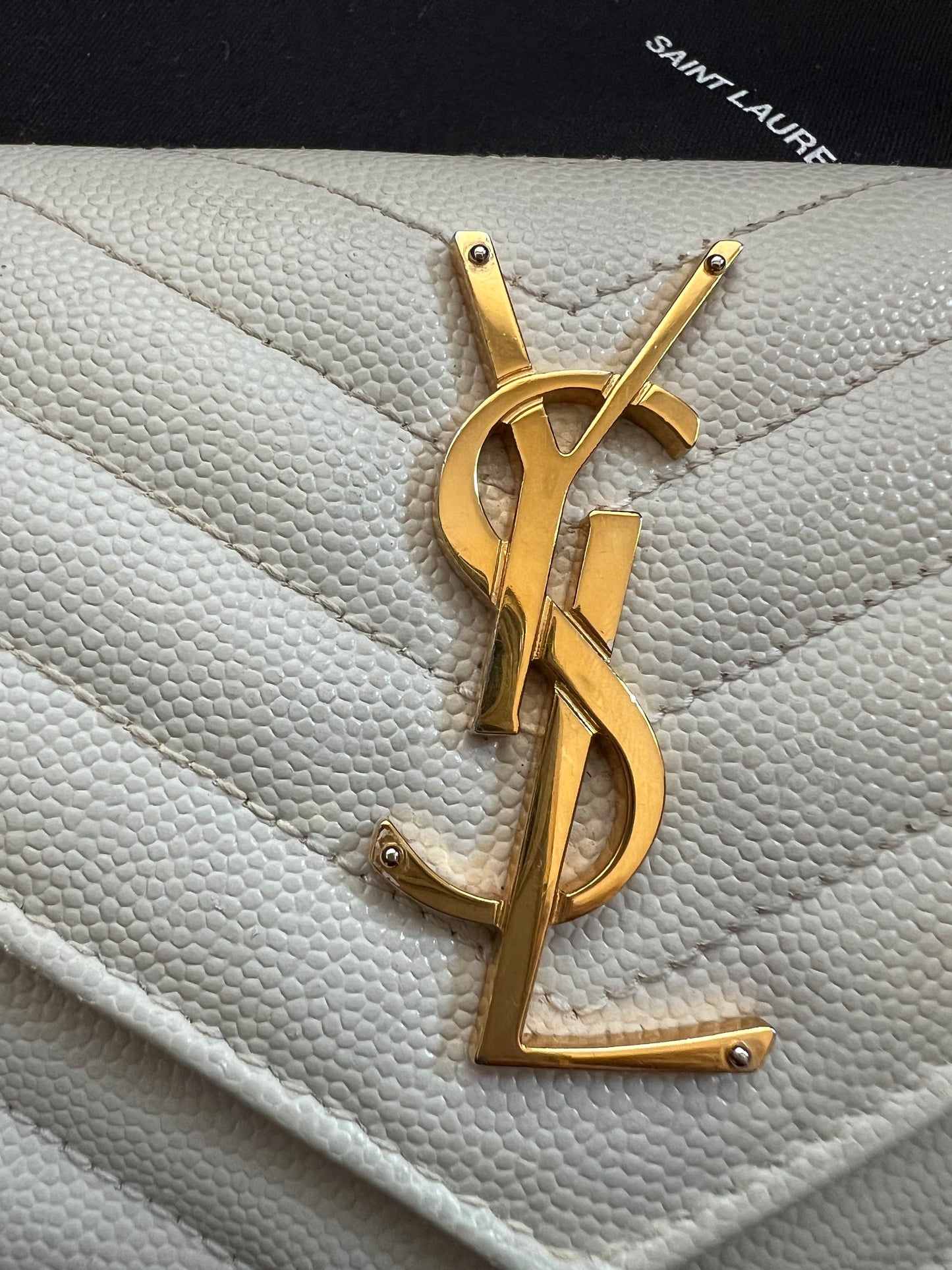 Crema YSL cassandre flap wallet on chain