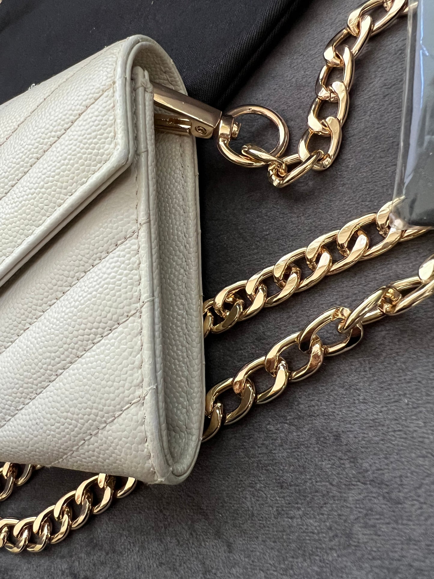 Crema YSL cassandre flap wallet on chain