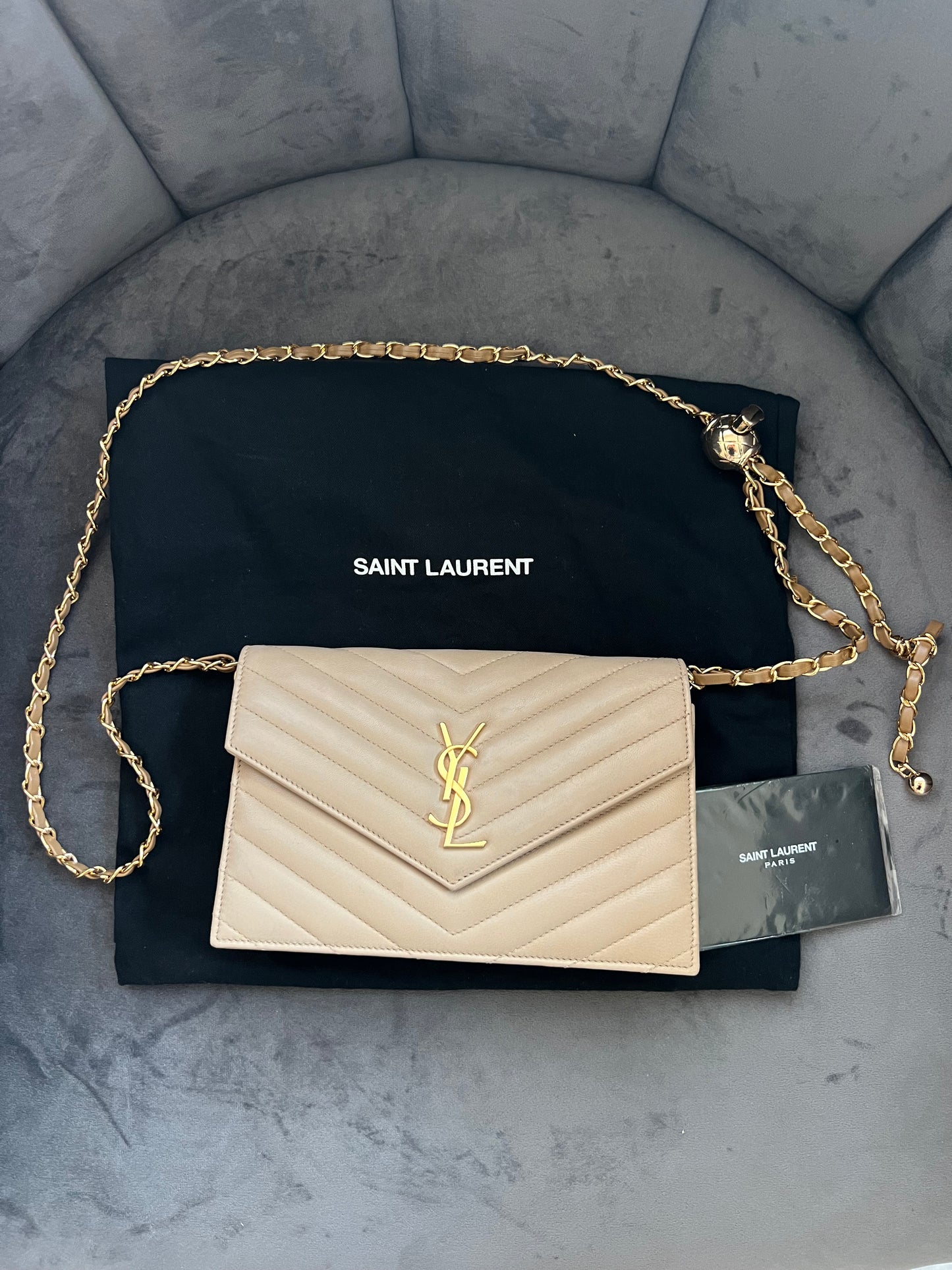 Yves Saint Laurent Cassandre beige envelope flap crossbody bag