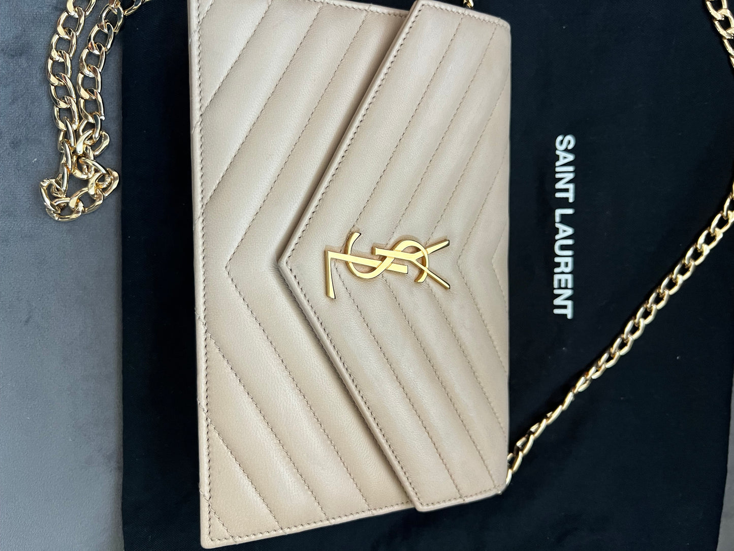 Yves Saint Laurent Cassandre beige envelope flap crossbody bag