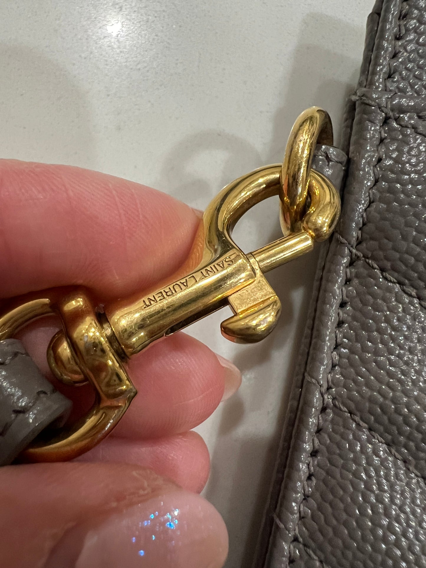 Yves Saint Laurent monogram matelasse wristlet