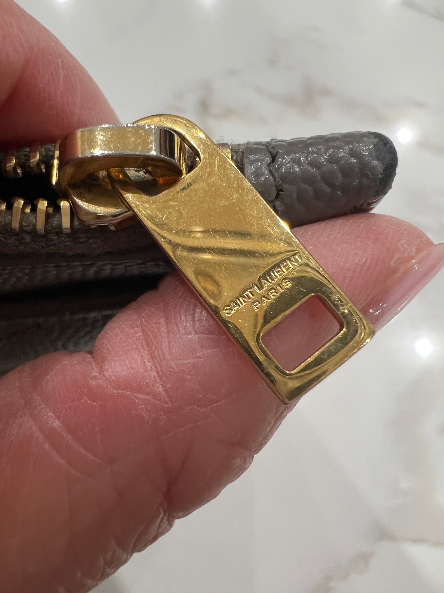 Yves Saint Laurent monogram matelasse wristlet