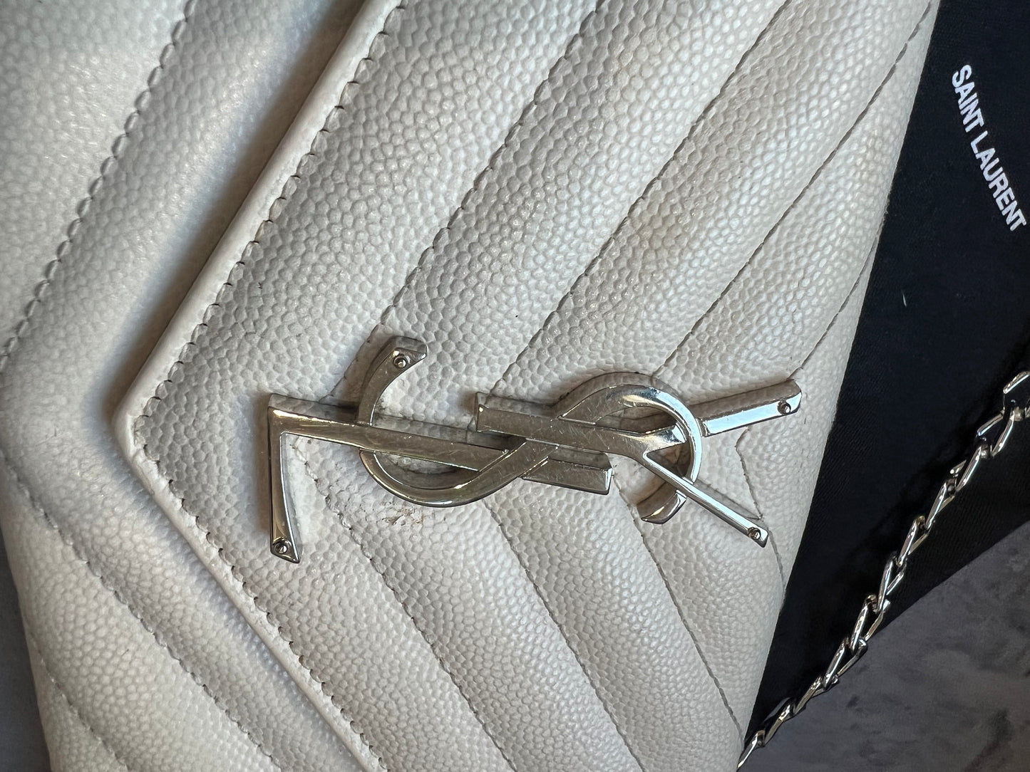 YSL Cassandre cream wallet on chain