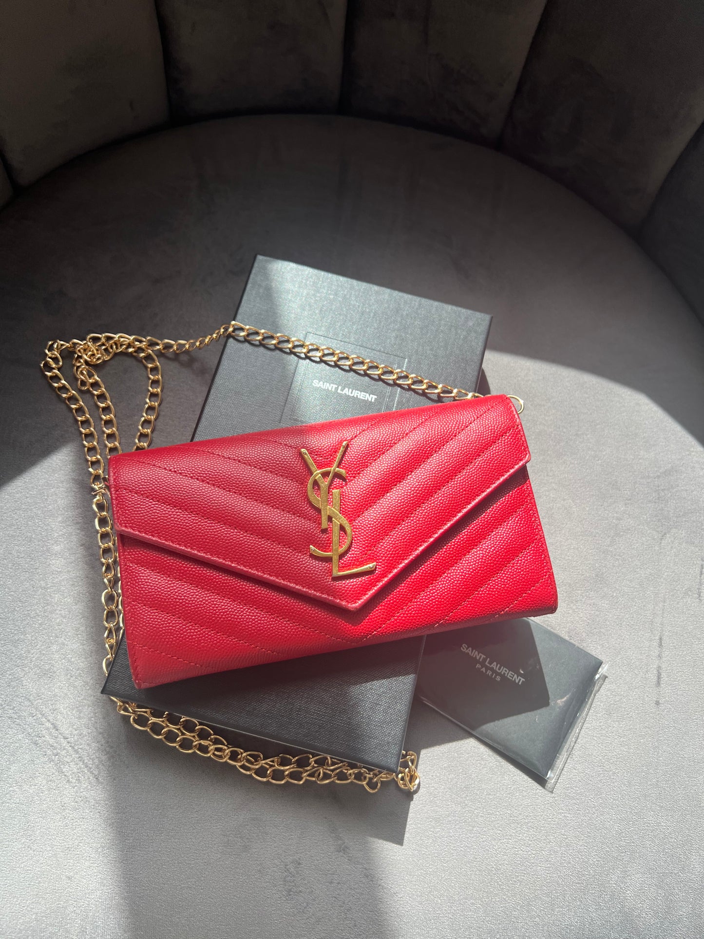 Yves Saint Laurent Cassandre envelope wallet on chain red