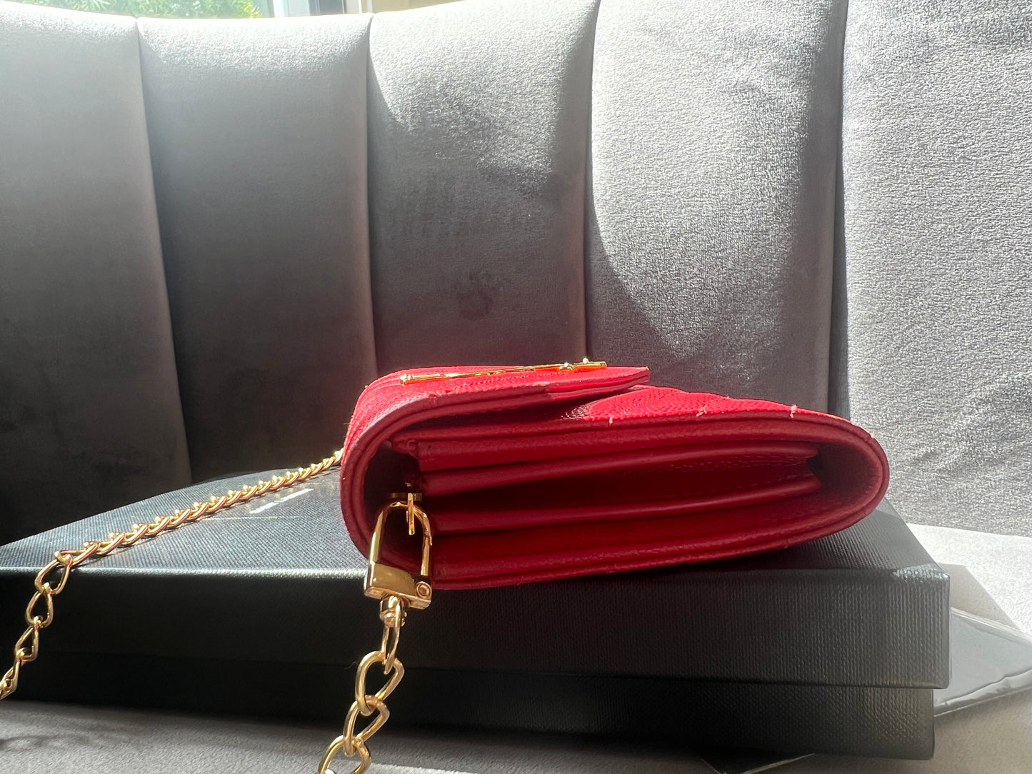 Yves Saint Laurent Cassandre envelope wallet on chain red