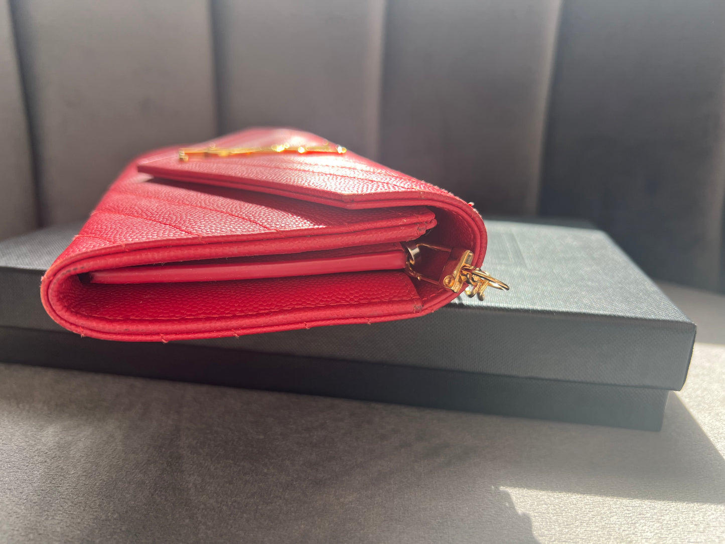 Yves Saint Laurent Cassandre envelope wallet on chain red