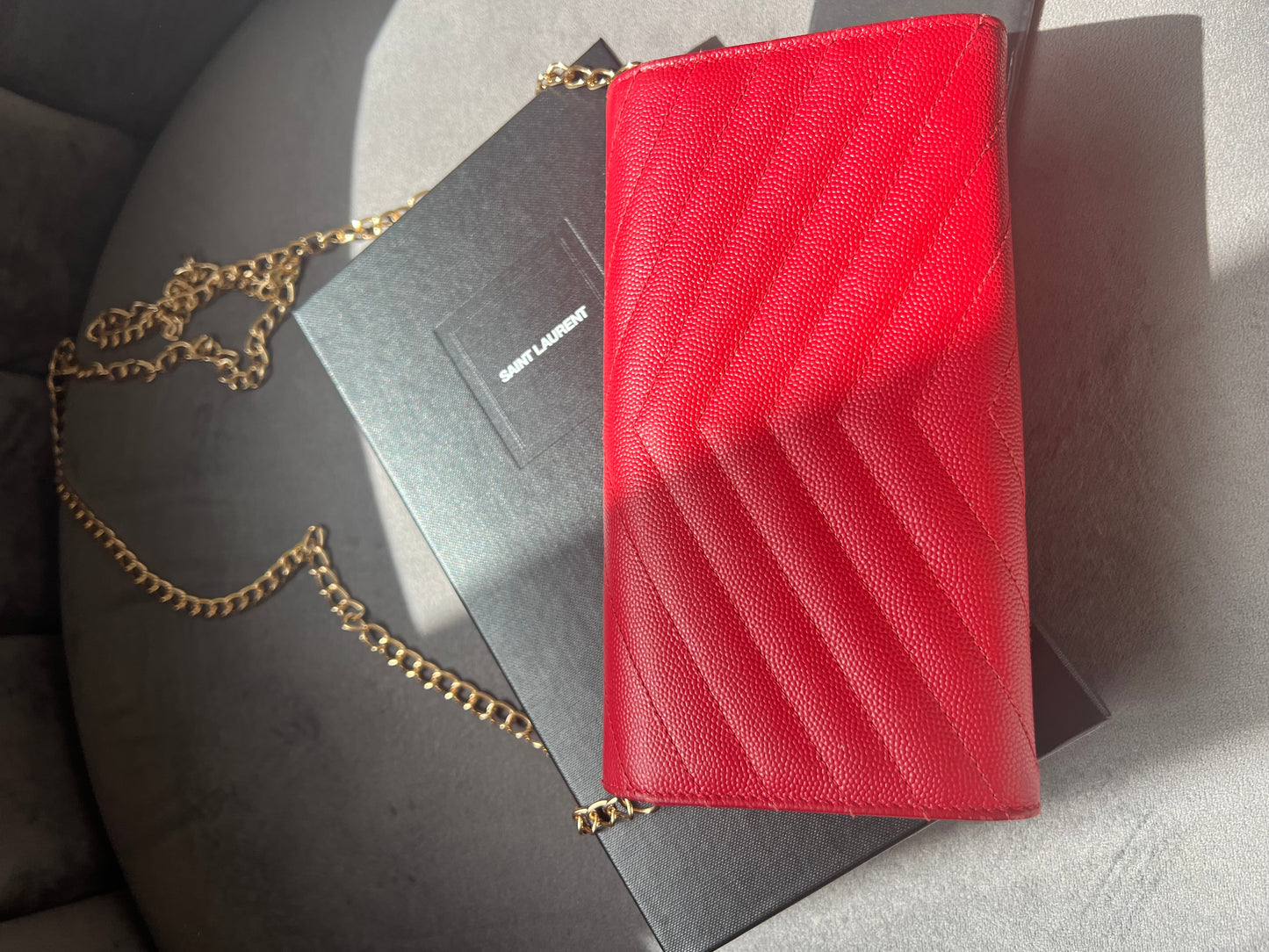 Yves Saint Laurent Cassandre envelope wallet on chain red