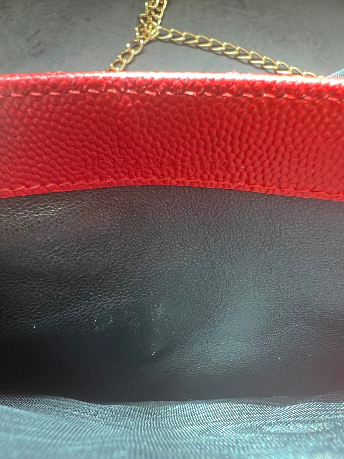 Yves Saint Laurent Cassandre envelope wallet on chain red