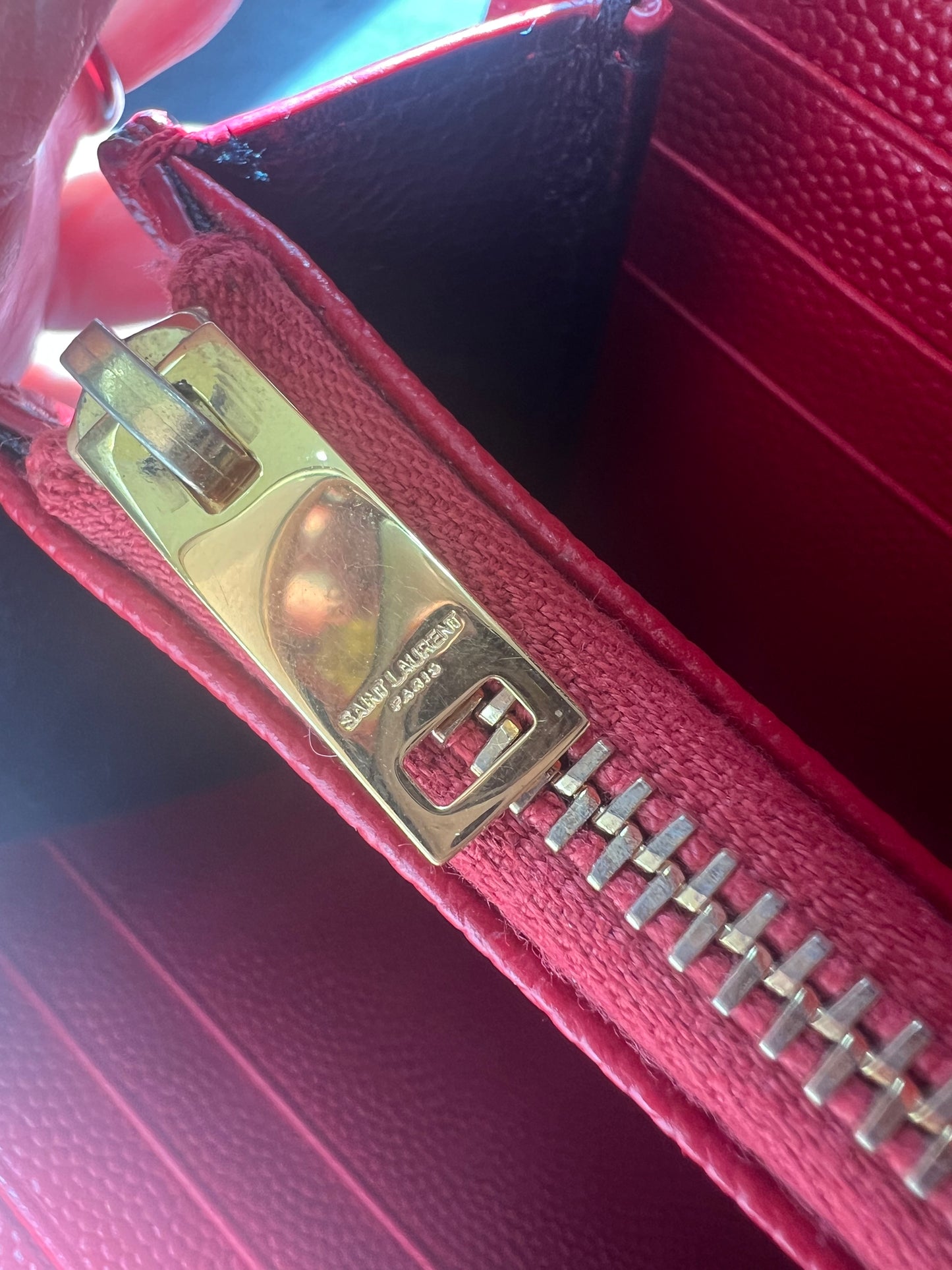 Yves Saint Laurent Cassandre envelope wallet on chain red